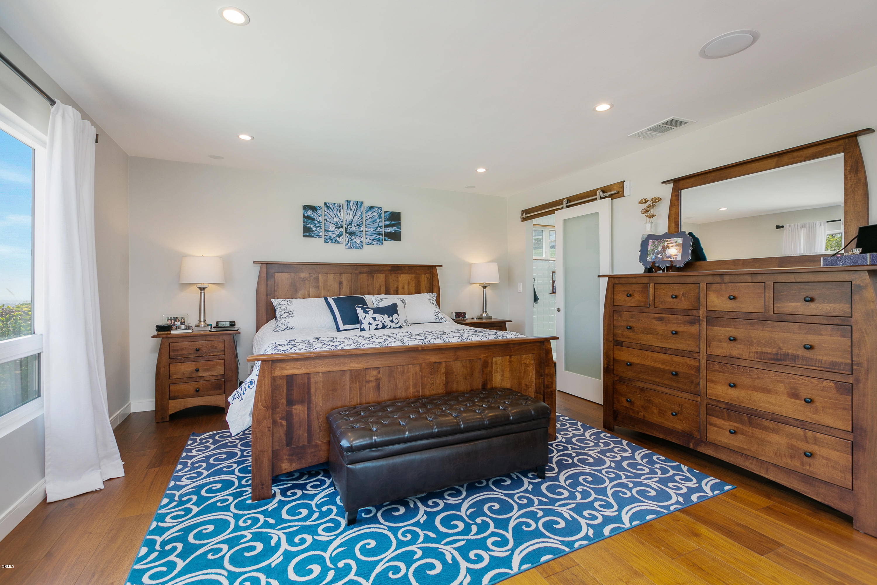 770 Panorama Place Pasadena, CA 91105 - Photo 20 of 47 a bedroom with a bed and wooden floor