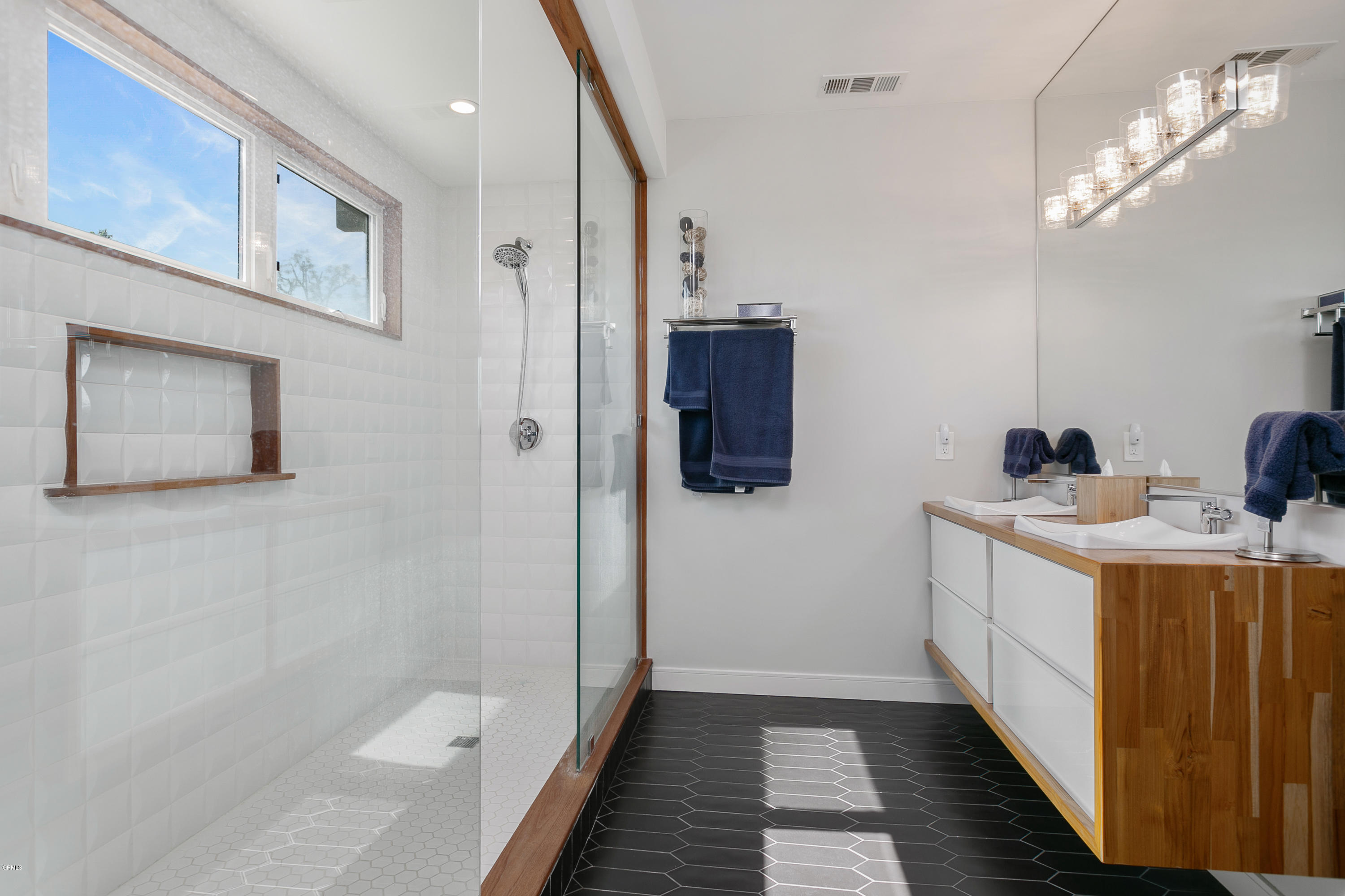 770 Panorama Place Pasadena, CA 91105 - Photo 21 of 47 a bathroom with a double vanity sink and mirror