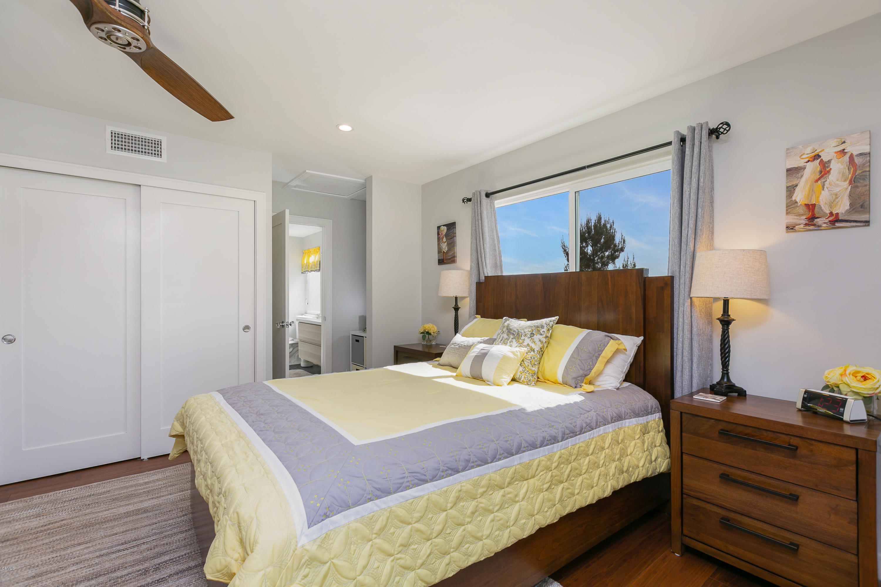 770 Panorama Place Pasadena, CA 91105 - Photo 23 of 47 a bedroom with a bed and a painting on the wall