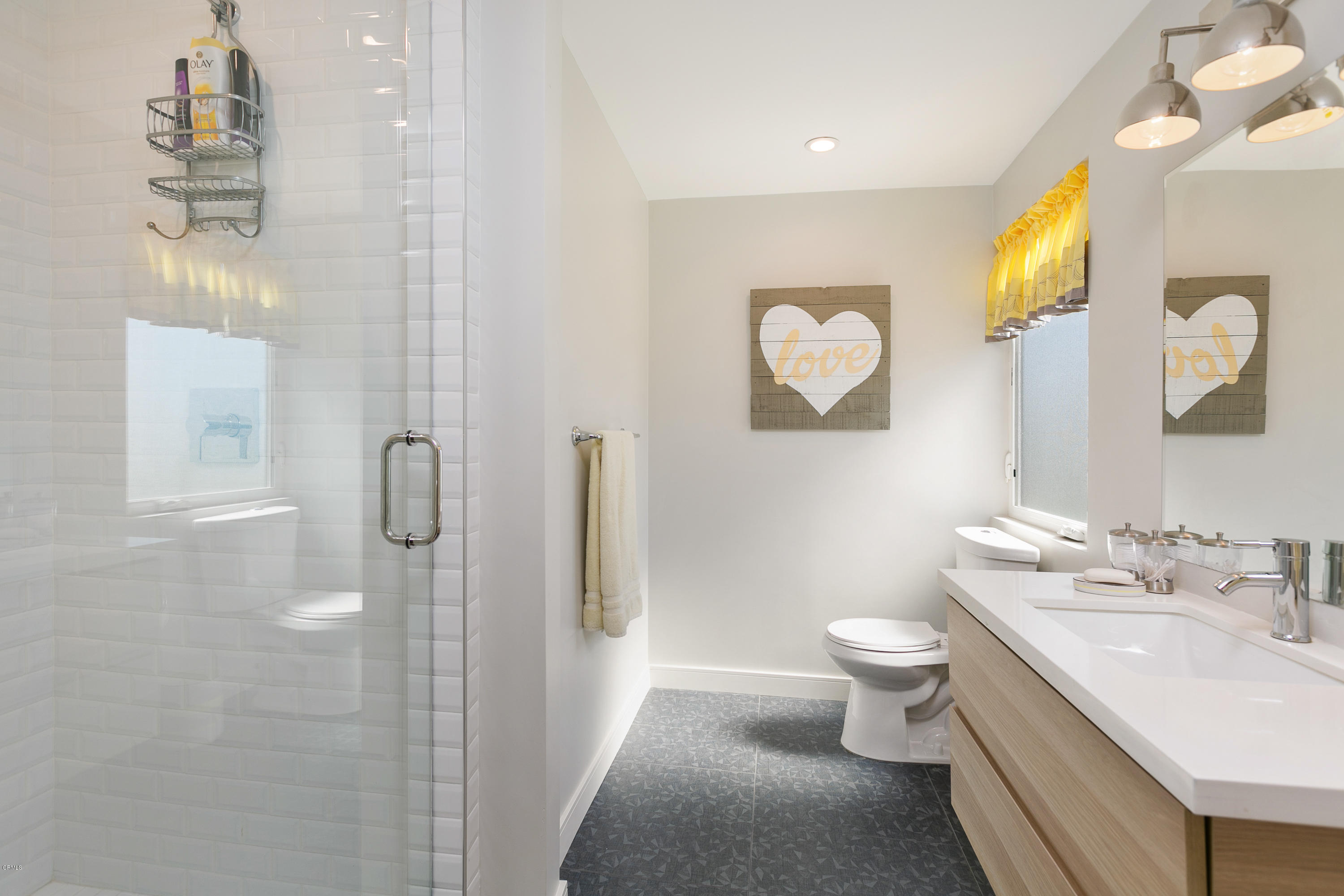 770 Panorama Place Pasadena, CA 91105 - Photo 24 of 47 a bathroom with a double vanity sink toilet and shower