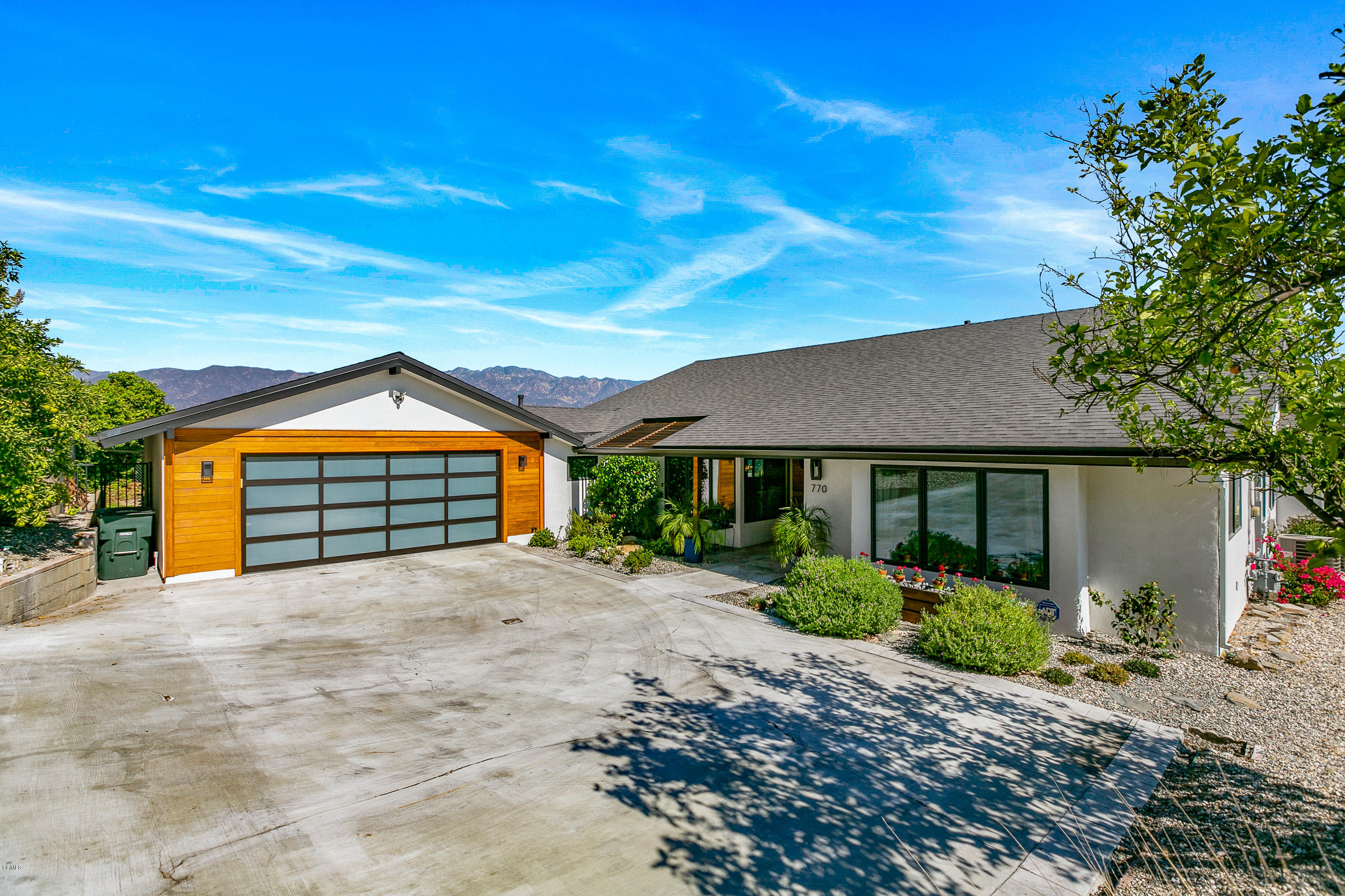 770 Panorama Place Pasadena, CA 91105 - Photo 46 of 47 a front view of a house with a yard and garage