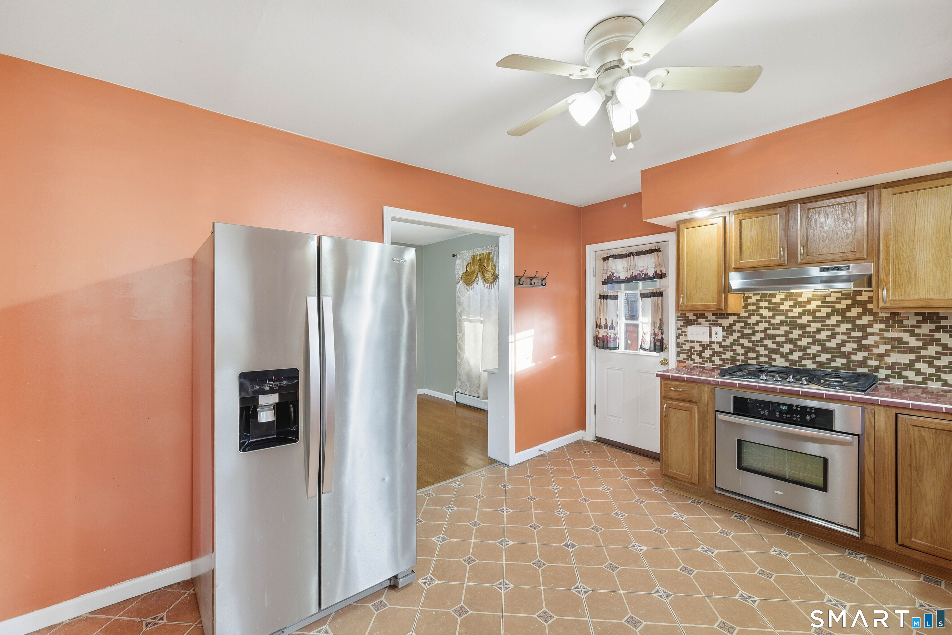10 Russell Road Norwich, CT 06360 - Photo 18 of 33 a kitchen with stainless steel appliances granite countertop a refrigerator a stove and a sink