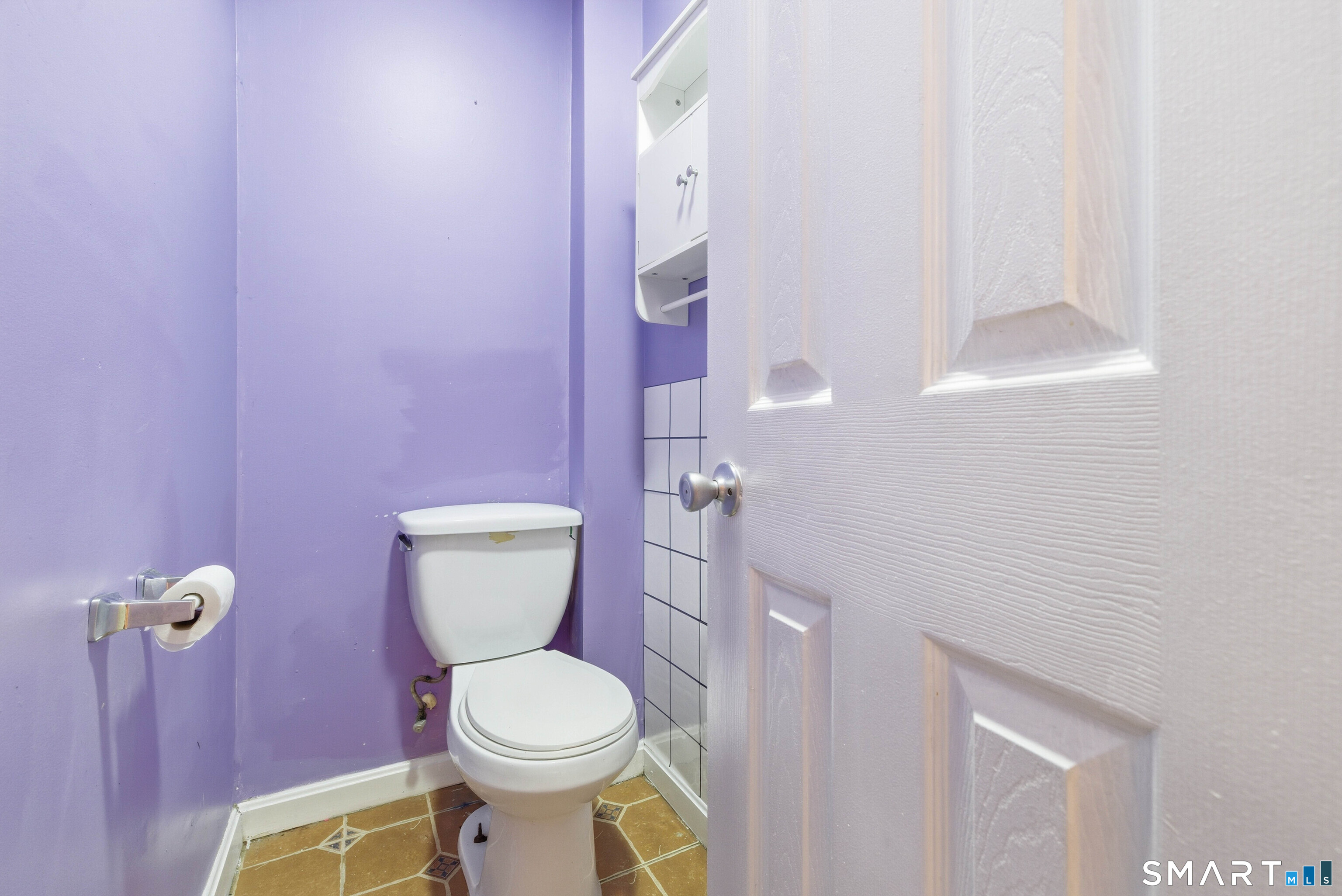 10 Russell Road Norwich, CT 06360 - Photo 19 of 33 a bathroom with a toilet a sink and mirror