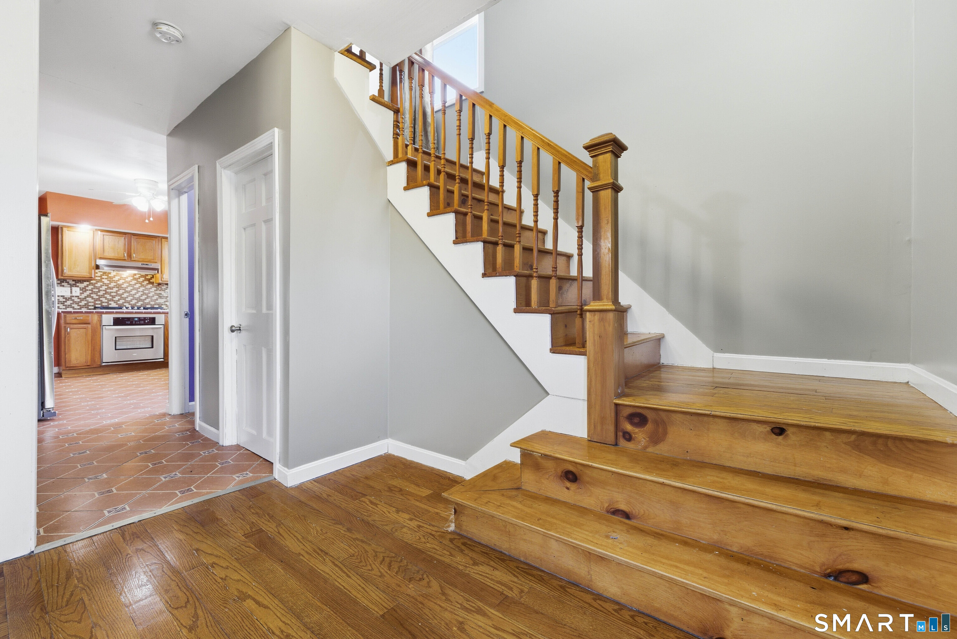 10 Russell Road Norwich, CT 06360 - Photo 10 of 33 a view of entryway and hall with wooden floor