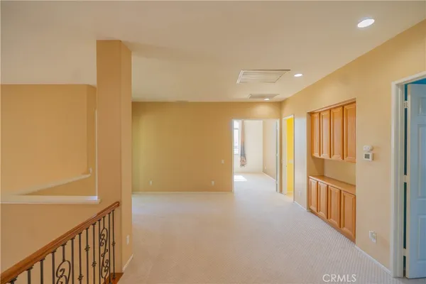 a view of a hallway with closet