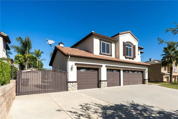 a front view of a house with a garage