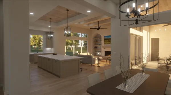 a living room with couches and chandelier with wooden floor