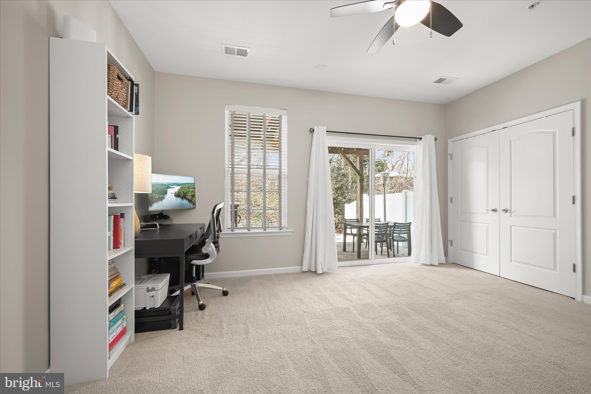 9890 Deer Run Laurel, MD 20723 - Photo 25 of 47 a view of a bedroom with workspace and a window