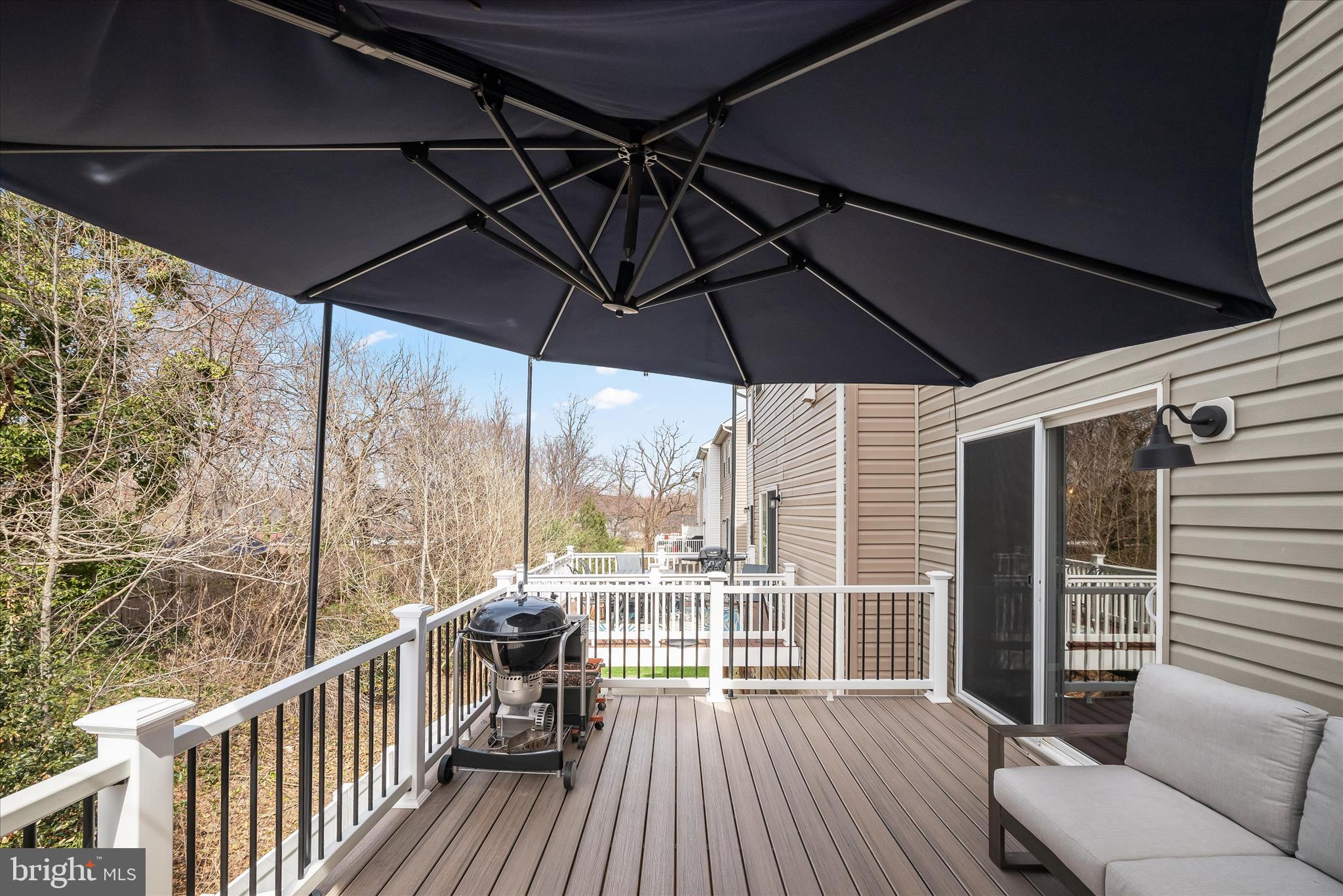 9890 Deer Run Laurel, MD 20723 - Photo 31 of 47 a view of a balcony with furniture and wooden floor