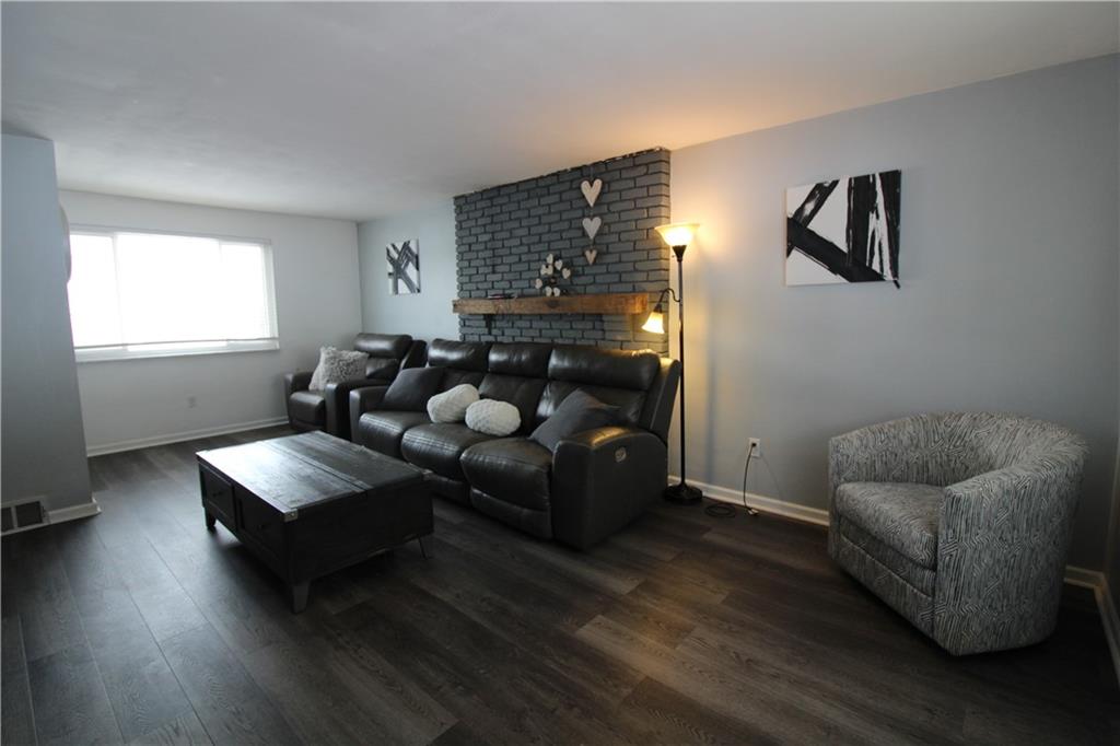 5877 Pleasant Street South Park, PA 15129 - Photo 18 of 34 a living room with furniture and a window