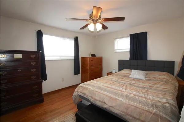 a bedroom with a bed and a closet