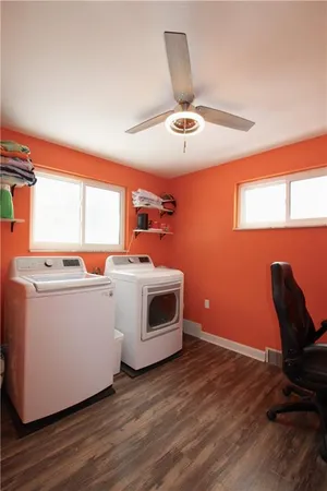 a room with furniture and wooden floor