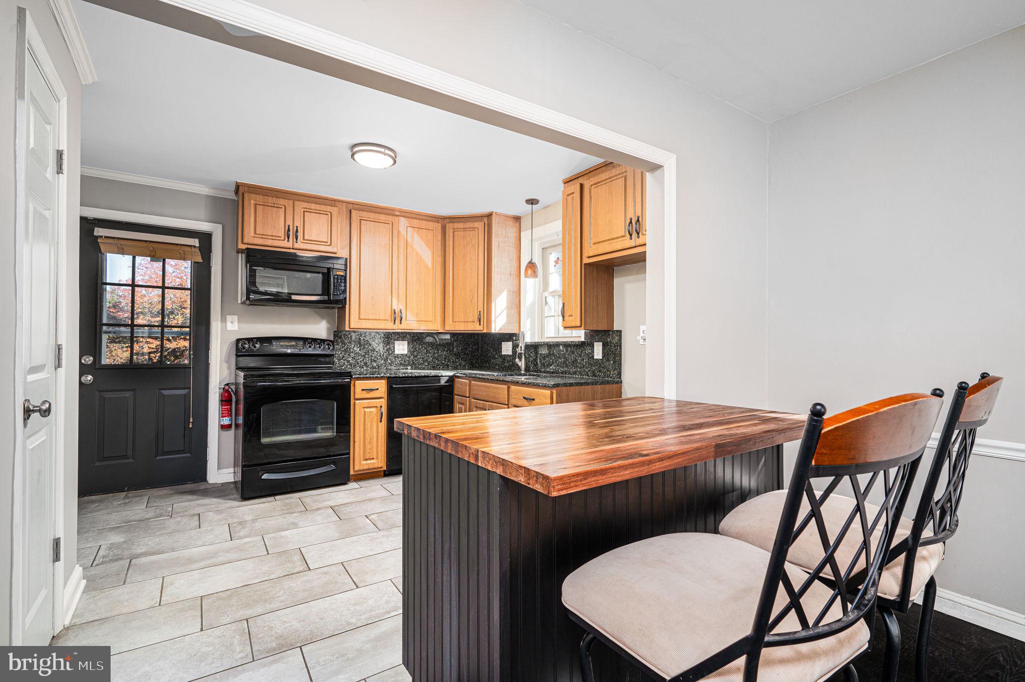 13 Ridley Drive Wallingford, PA 19086 - Photo 9 of 19 Breakfast Bar to Kitchen