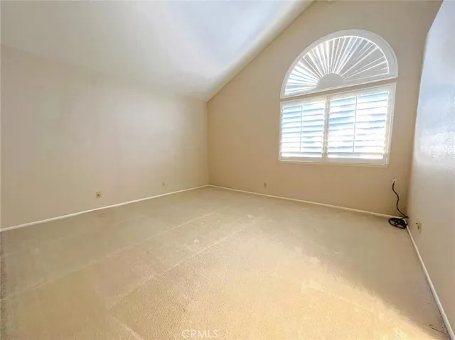 a bathroom with a double vanity sink and mirror