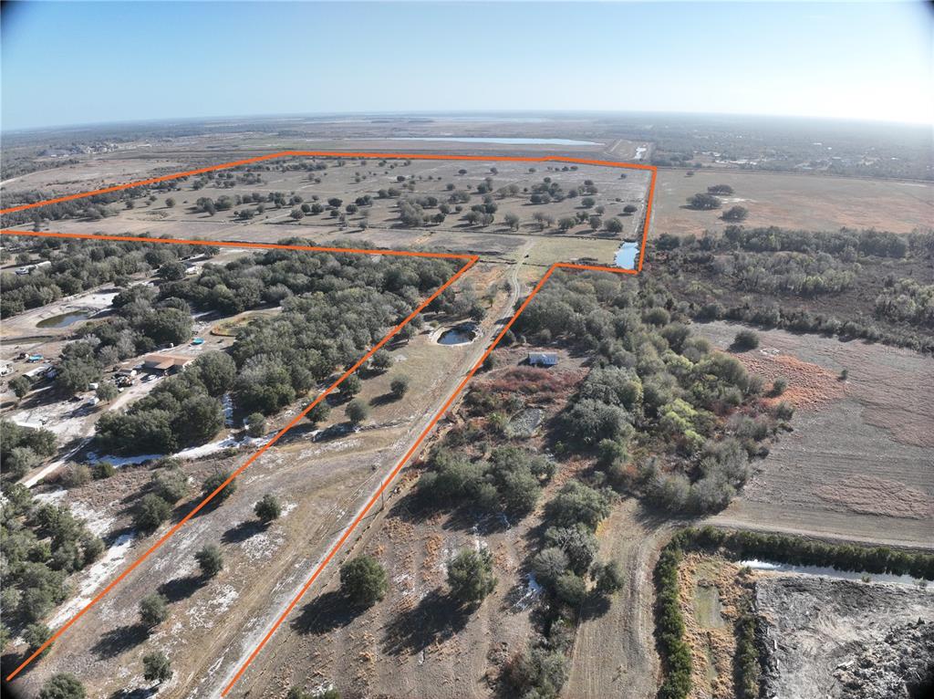 834 Logue Road Myakka City, FL 34251 - Photo 4 of 19 an aerial view of beach and ocean