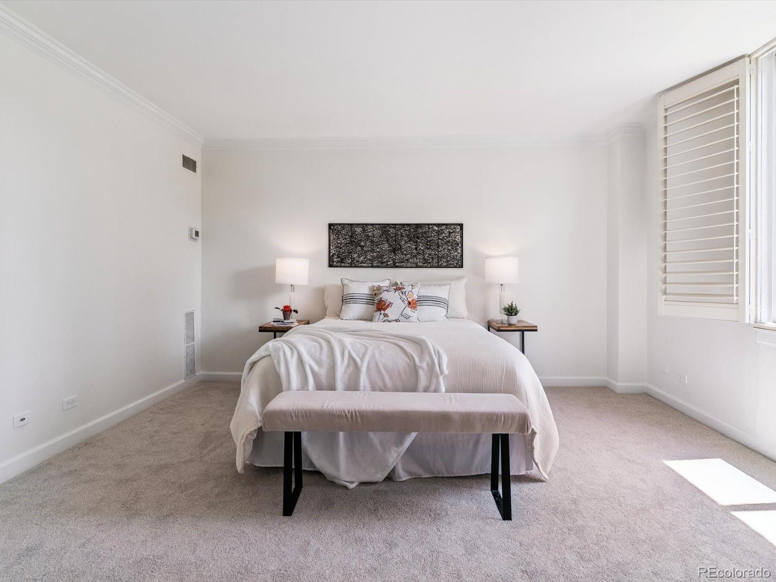 1111 Race Street, Unit 3A Denver, CO 80206 - Photo 19 of 39 a bedroom with bed and a window