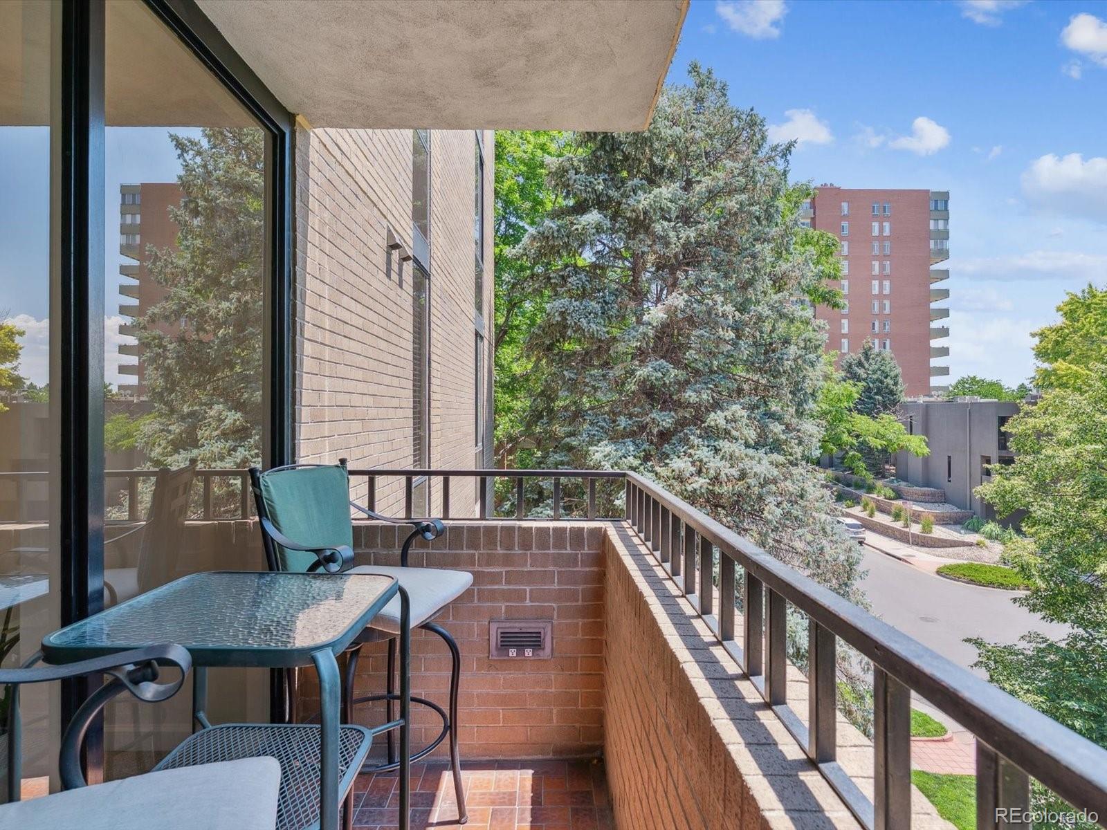 1111 Race Street, Unit 3A Denver, CO 80206 - Photo 27 of 39 a view of a balcony with chairs