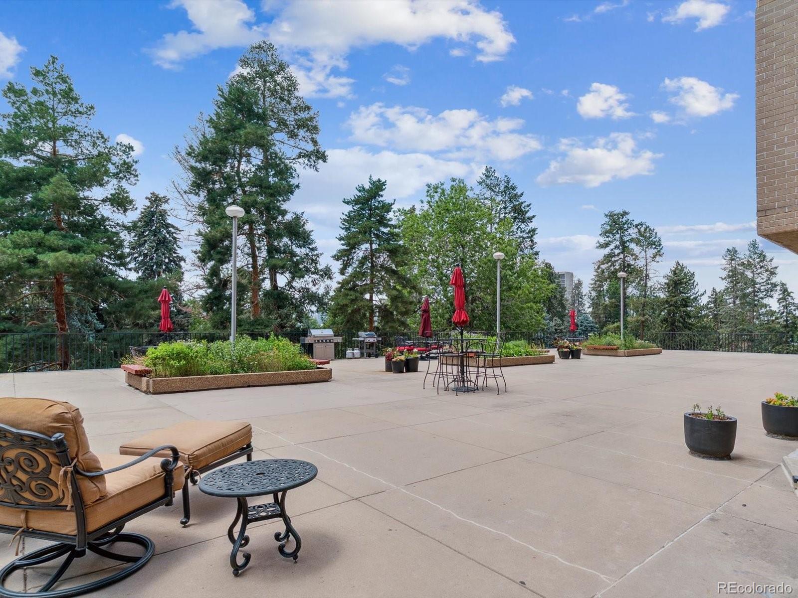 1111 Race Street, Unit 3A Denver, CO 80206 - Photo 28 of 39 a view of a backyard patio and fire pit