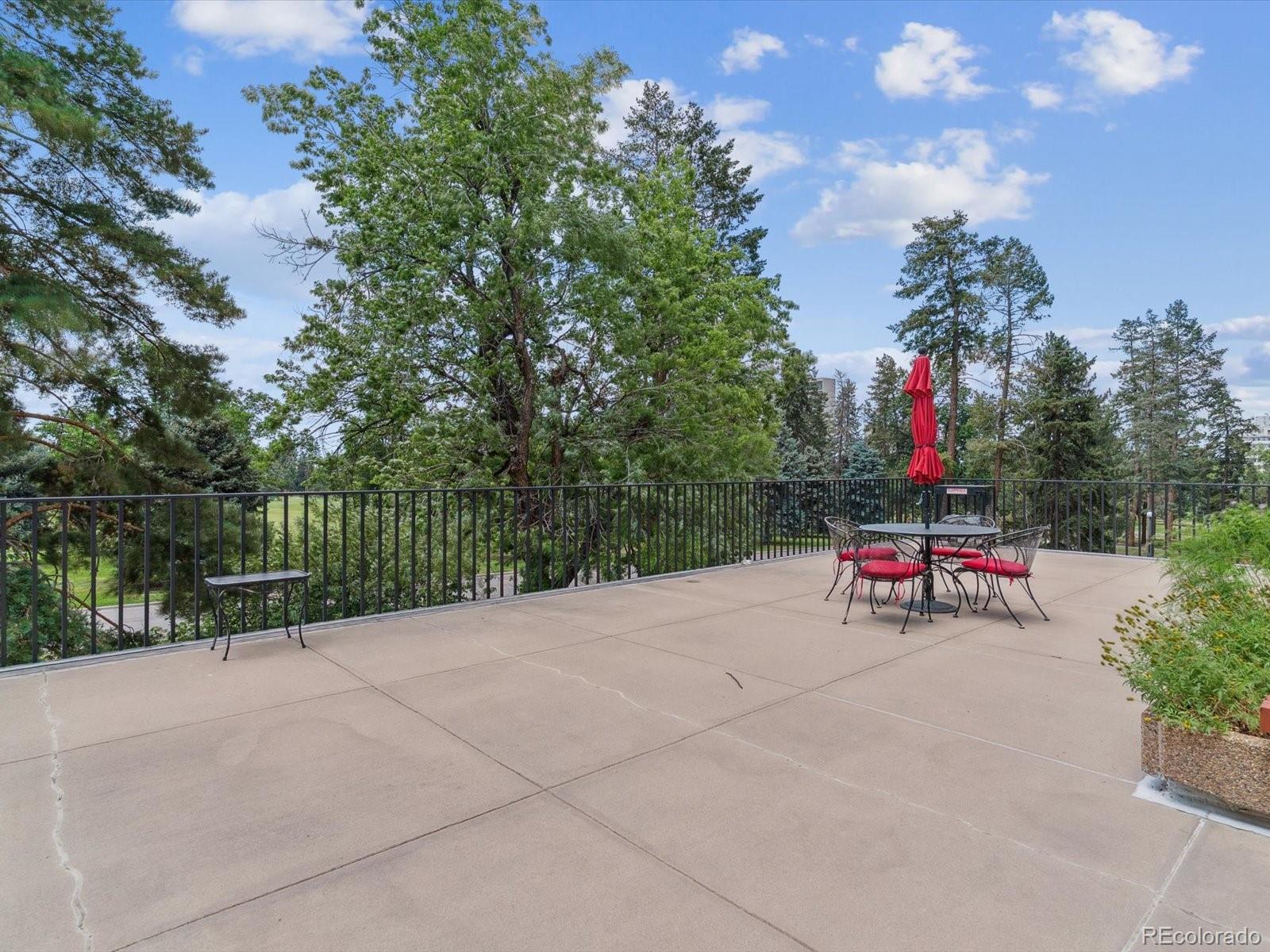 1111 Race Street, Unit 3A Denver, CO 80206 - Photo 30 of 39 a view of a backyard with a bench