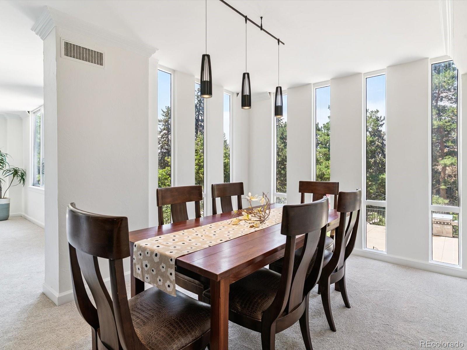 1111 Race Street, Unit 3A Denver, CO 80206 - Photo 7 of 39 a view of a dining room with furniture