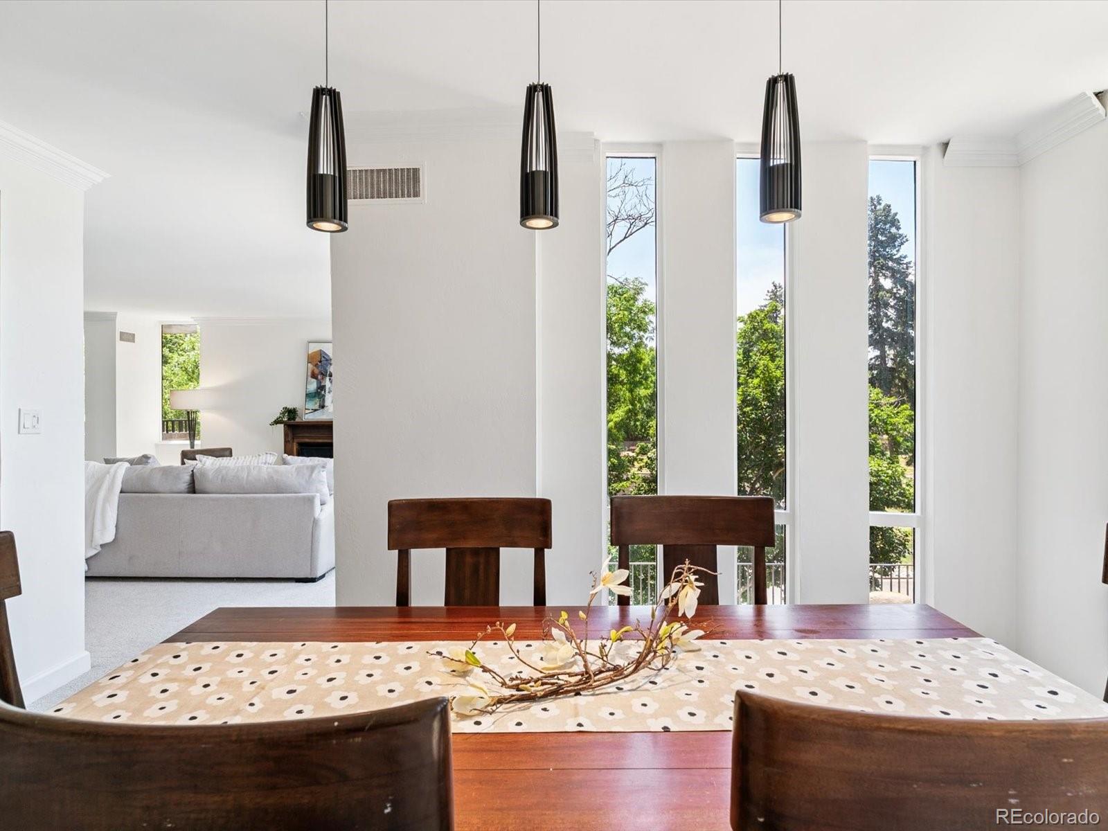 1111 Race Street, Unit 3A Denver, CO 80206 - Photo 8 of 39 a view of living room with furniture and floor to ceiling window