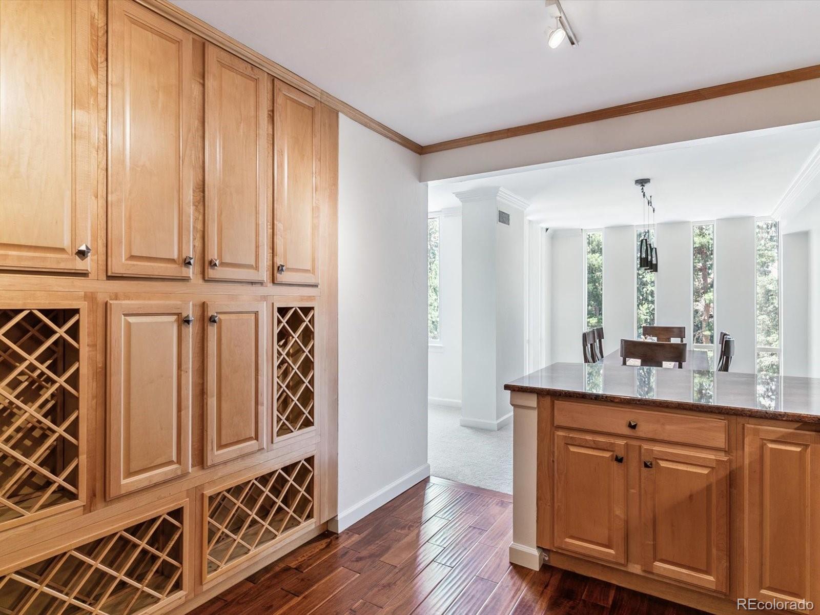 1111 Race Street, Unit 3A Denver, CO 80206 - Photo 9 of 39 a bathroom with a sink a mirror and a shower
