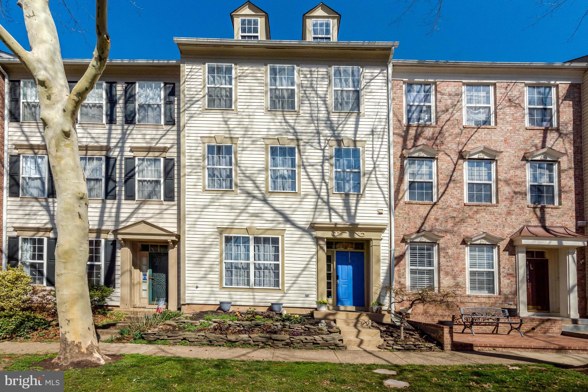 43546 Mink Meadows Street Chantilly, VA 20152 - Photo 1 of 48 a front view of a house with yard and patio