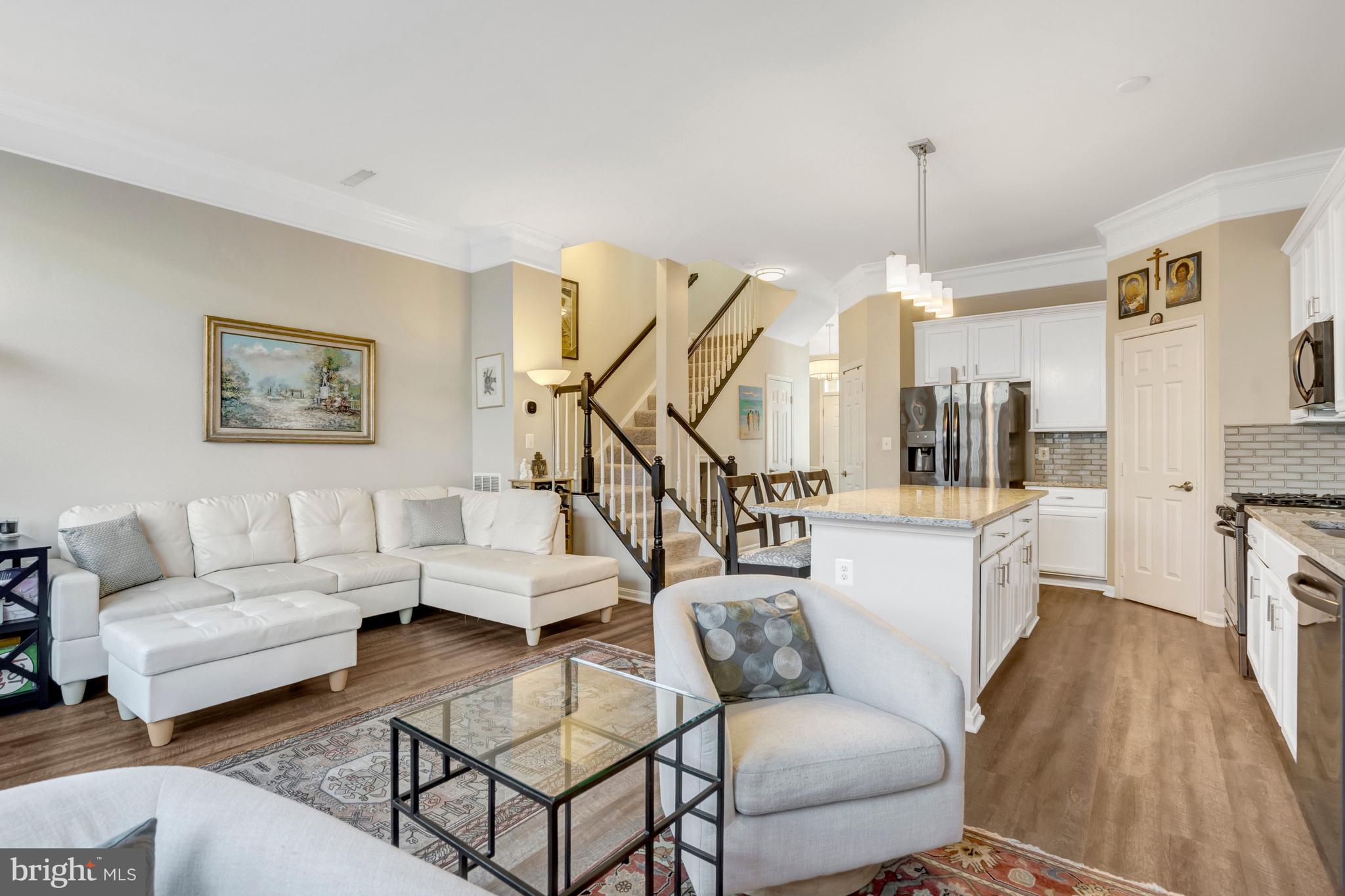 43546 Mink Meadows Street Chantilly, VA 20152 - Photo 15 of 48 a living room with furniture and a wooden floor