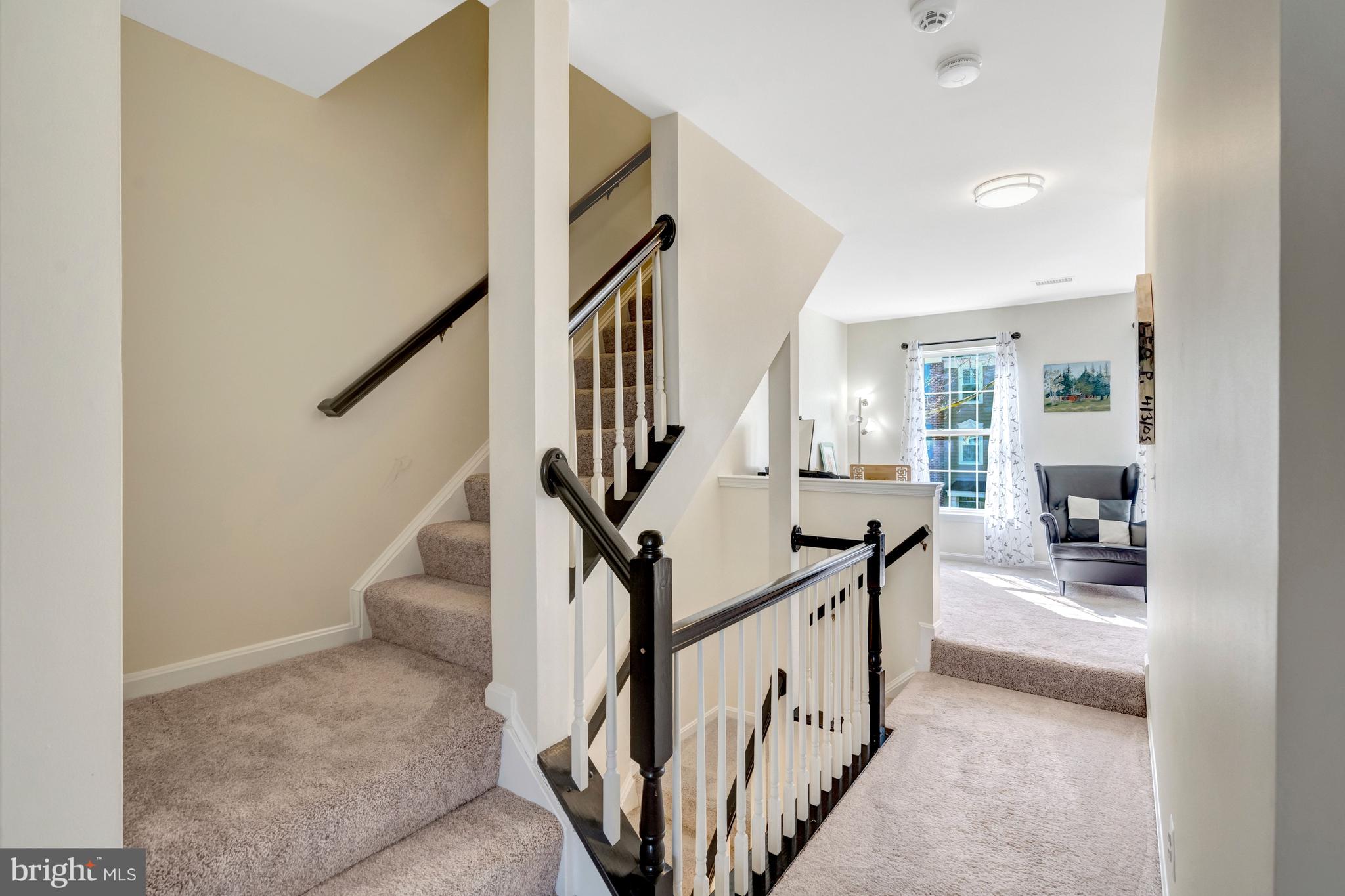 43546 Mink Meadows Street Chantilly, VA 20152 - Photo 21 of 48 a view of entryway and hall with wooden floor