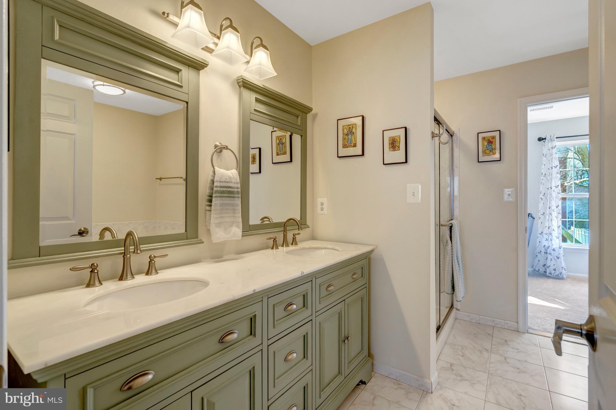 43546 Mink Meadows Street Chantilly, VA 20152 - Photo 27 of 48 a bathroom with a granite countertop sink mirror and a