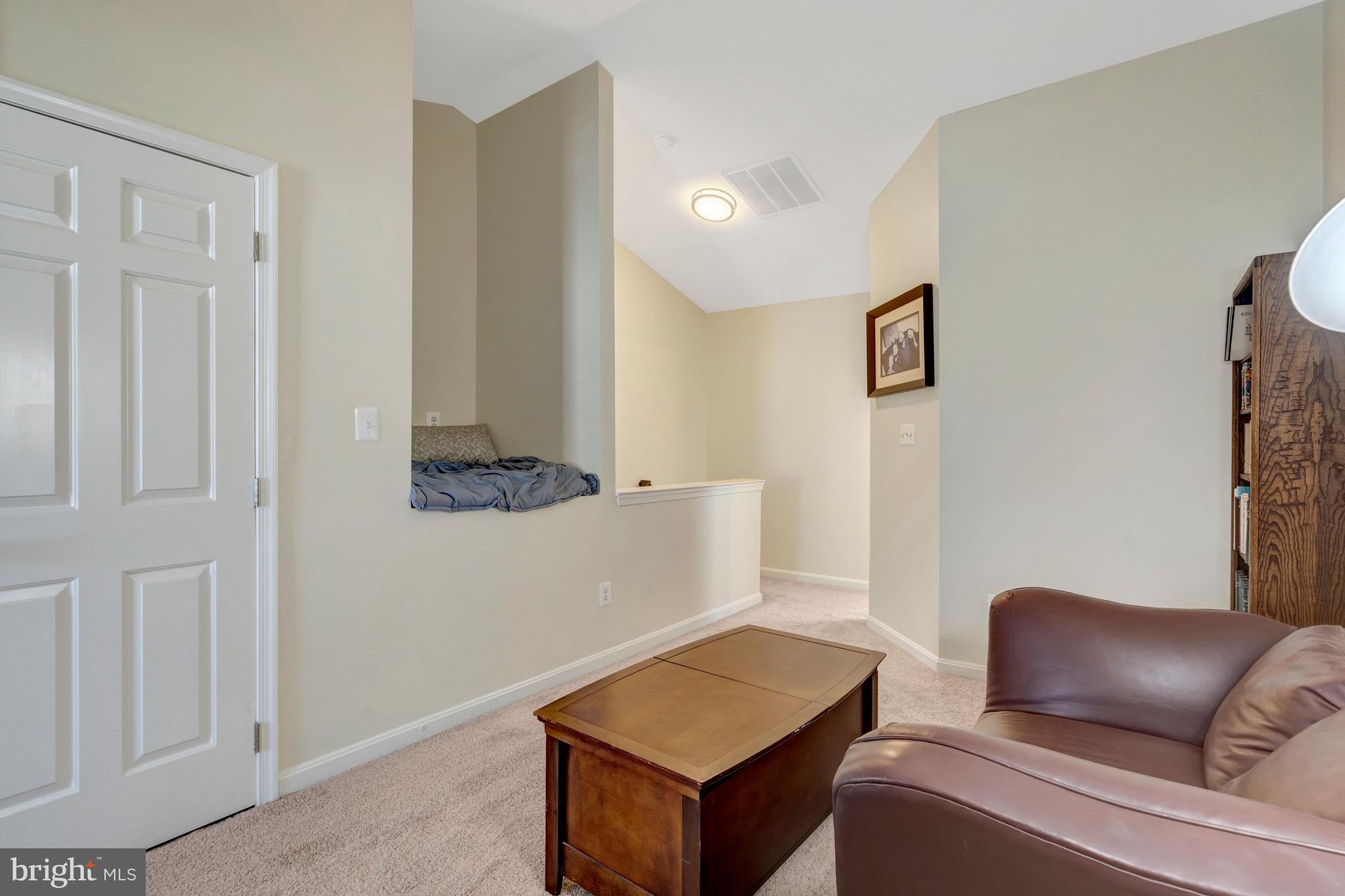 43546 Mink Meadows Street Chantilly, VA 20152 - Photo 40 of 48 a living room with furniture and a window