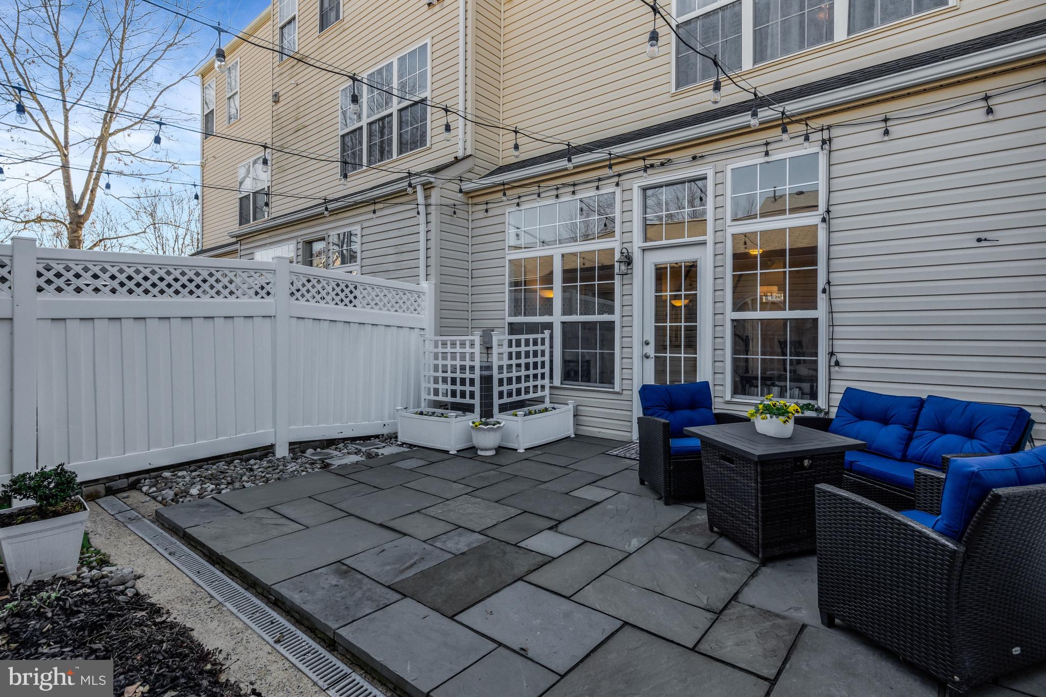 43546 Mink Meadows Street Chantilly, VA 20152 - Photo 43 of 48 a view of a two chairs in the back yard
