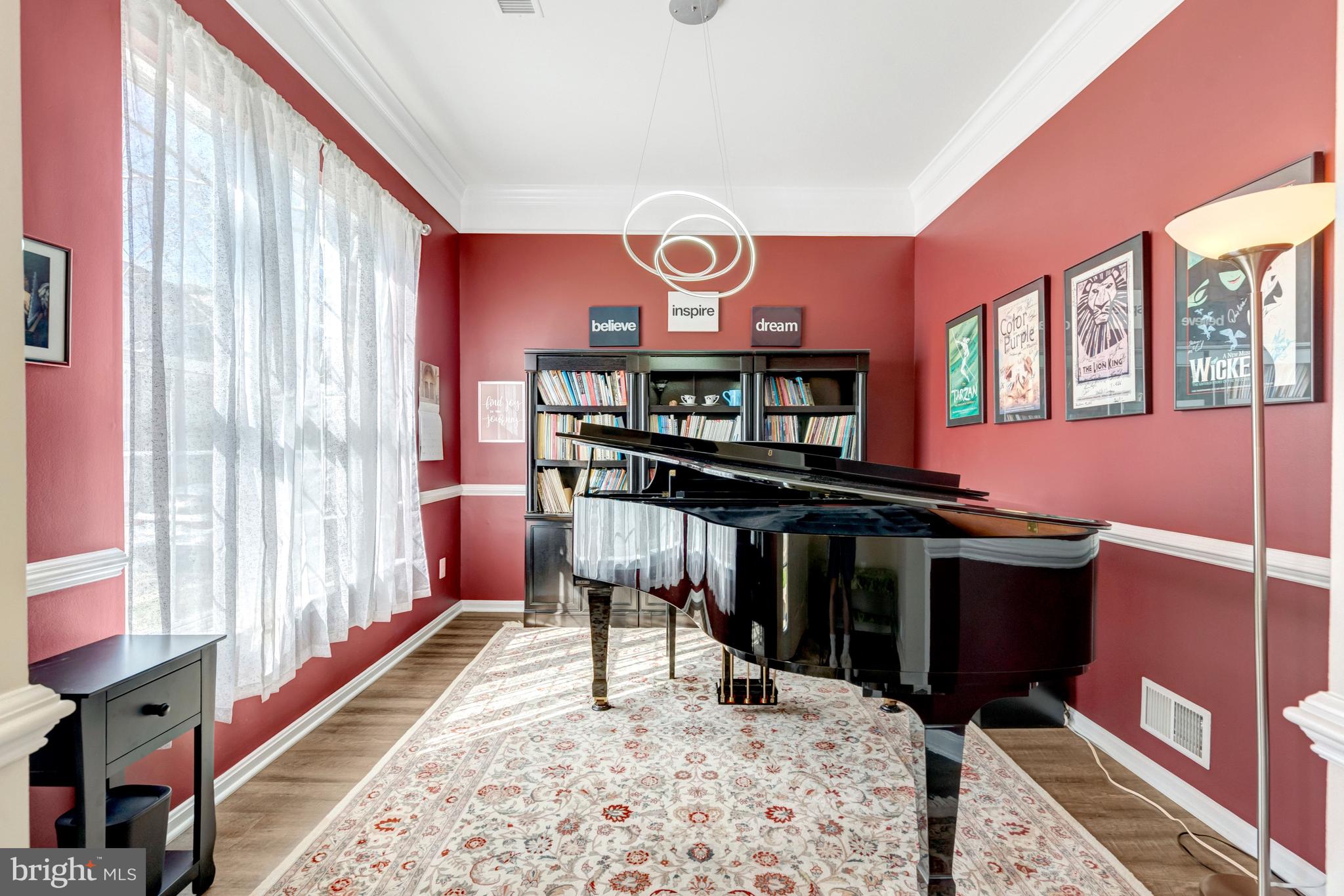 43546 Mink Meadows Street Chantilly, VA 20152 - Photo 5 of 48 a view of a dining room with furniture and a window