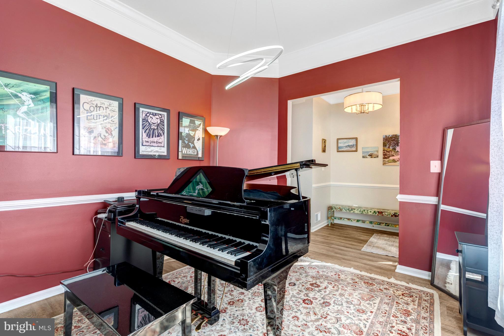 43546 Mink Meadows Street Chantilly, VA 20152 - Photo 6 of 48 a room with furniture and a piano