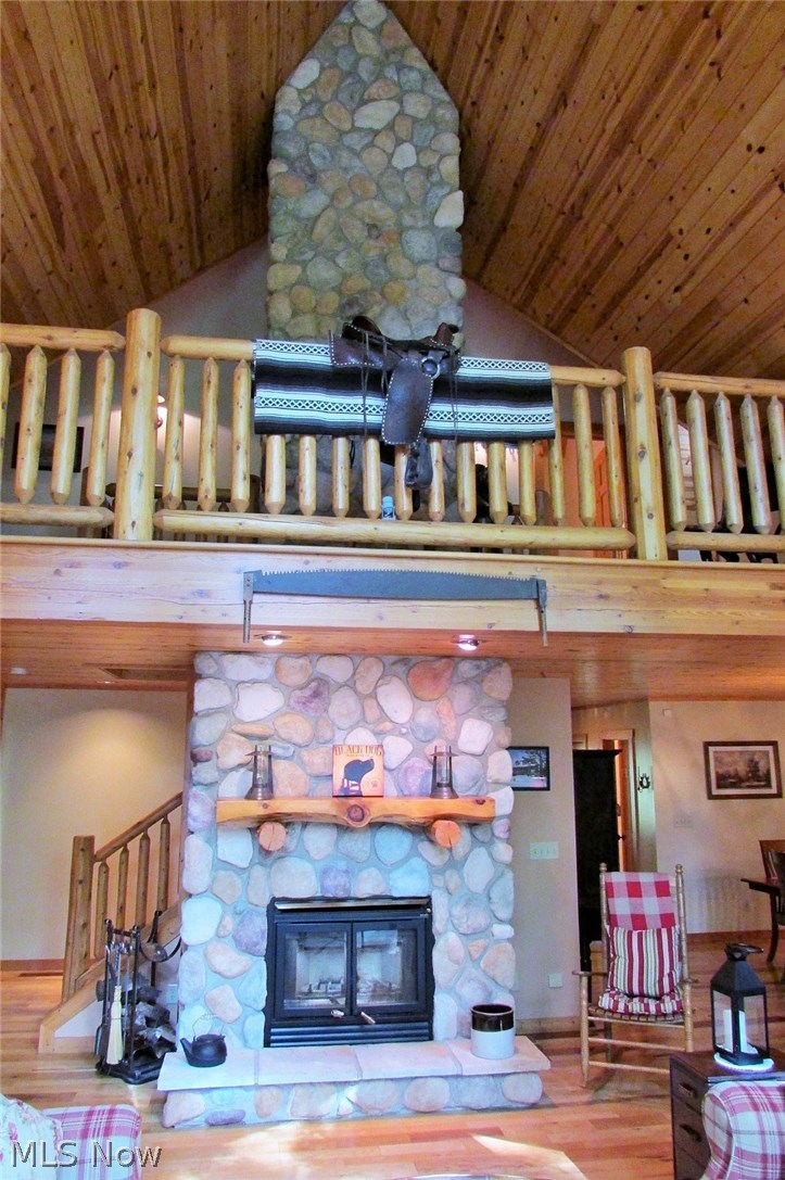 6840 Williams Road Painesville, OH 44077 - Photo 15 of 34 One of two staircases rises behind the fireplace.