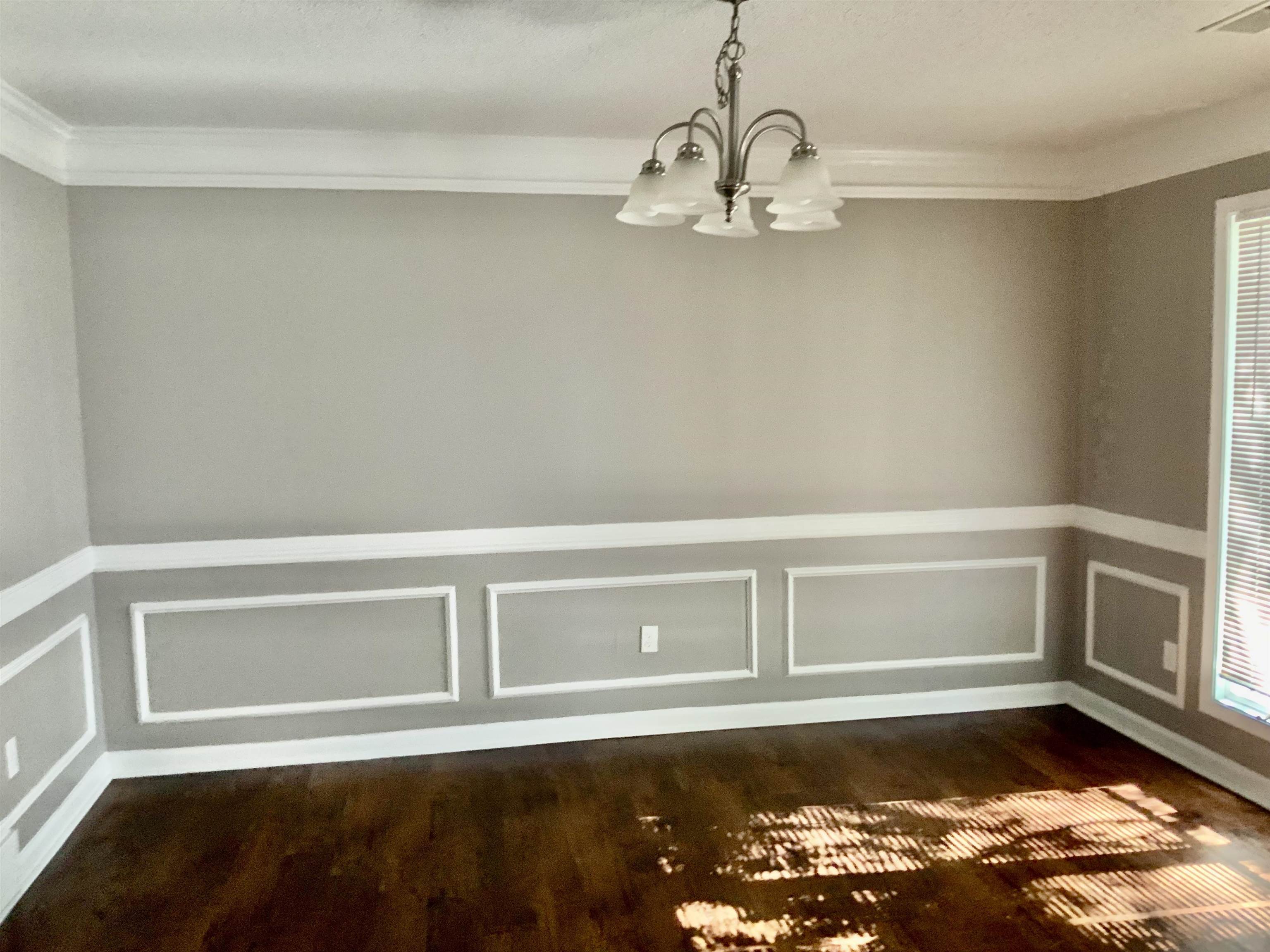 83 South Walnut Bend Road Memphis, TN 38018 - Photo 6 of 24 a view of a room with wooden floor and cabinet