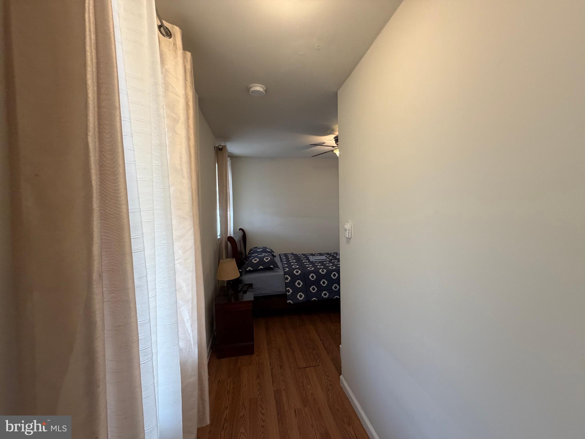 7103 Rising Sun Avenue, Unit C Philadelphia, PA 19111 - Photo 12 of 19 a view of a hallway with a livingroom and a hallway with wooden floor