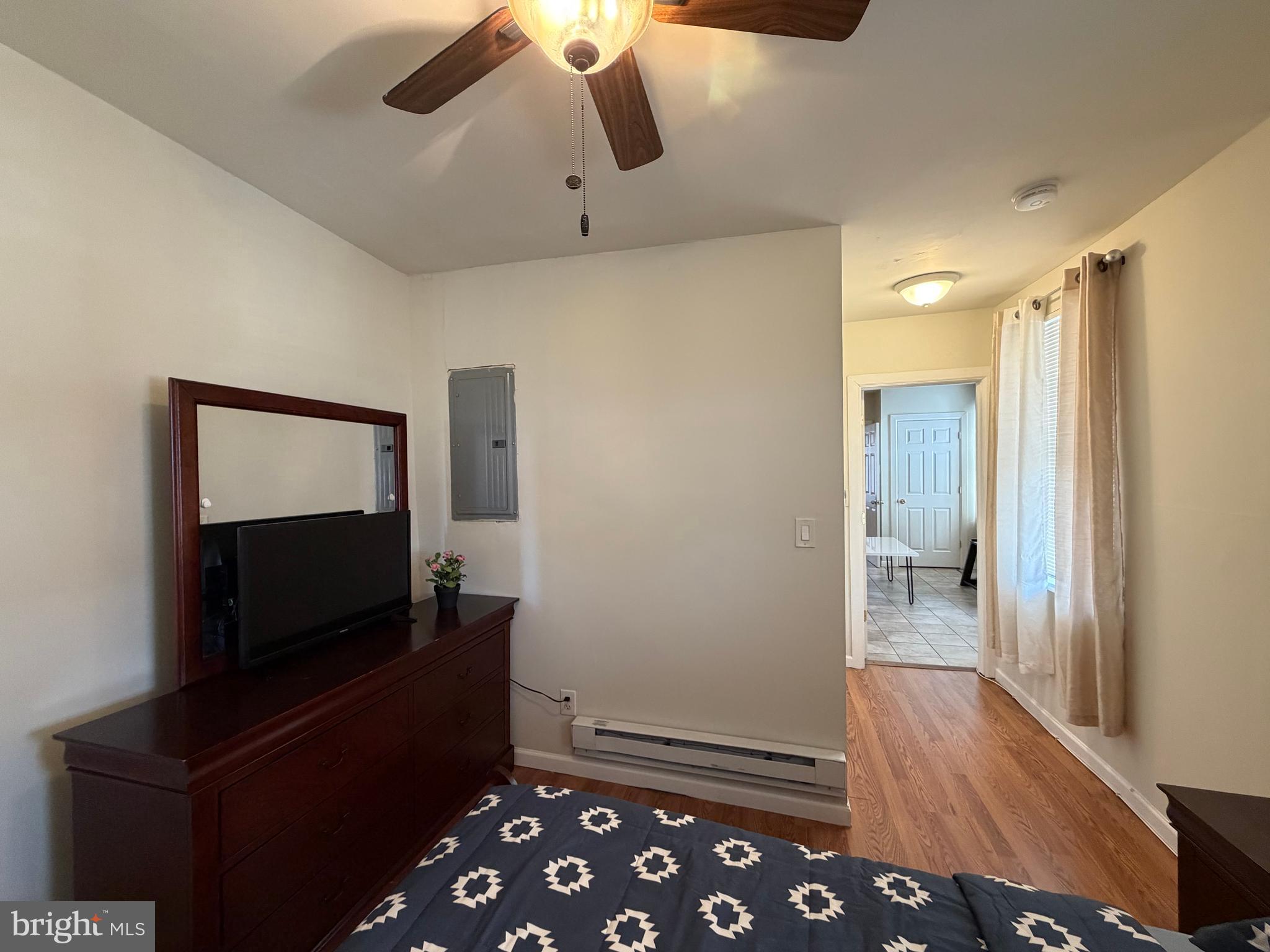 7103 Rising Sun Avenue, Unit C Philadelphia, PA 19111 - Photo 14 of 19 a living room with furniture and a flat screen tv