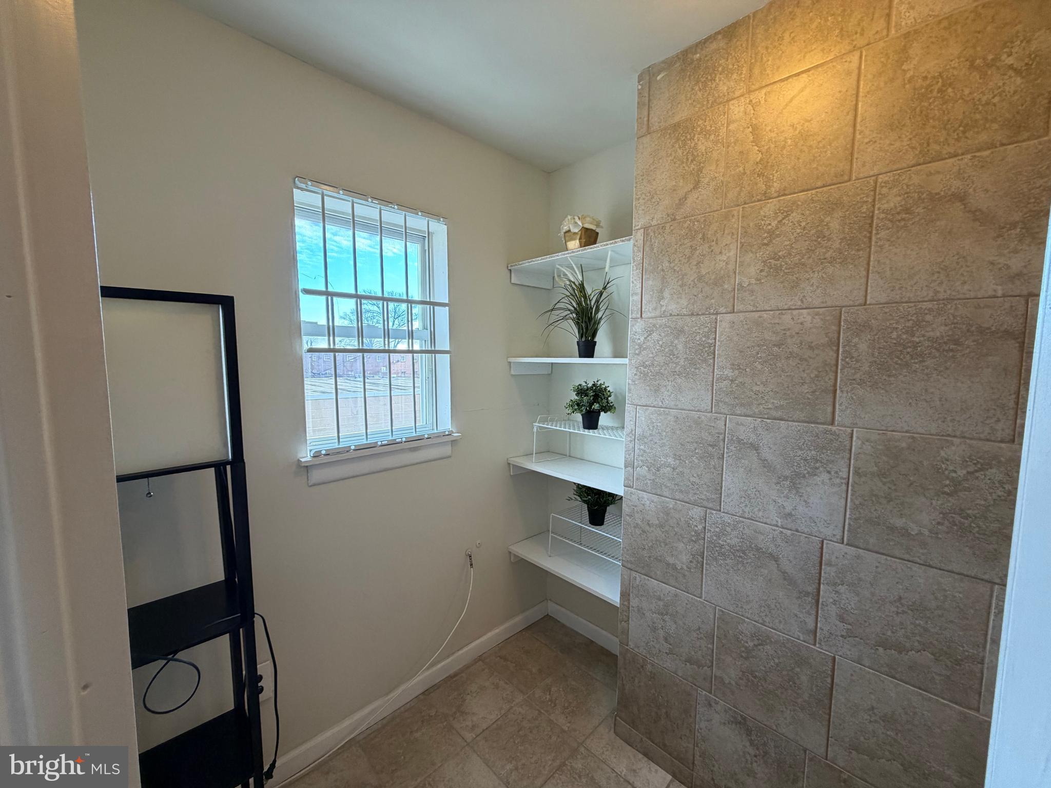 7103 Rising Sun Avenue, Unit C Philadelphia, PA 19111 - Photo 15 of 19 a bathroom with a sink and a shower