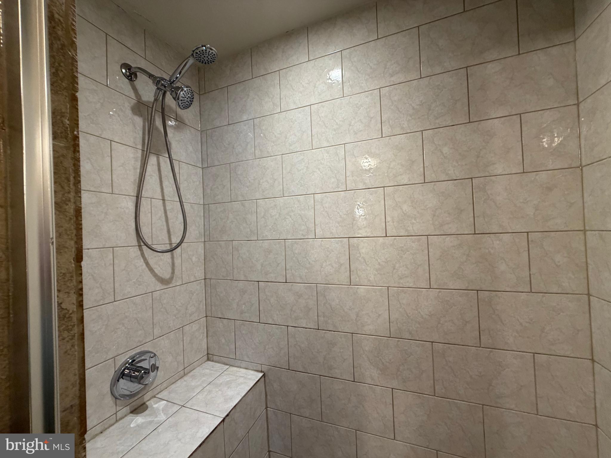 7103 Rising Sun Avenue, Unit C Philadelphia, PA 19111 - Photo 18 of 19 a bathroom with a shower