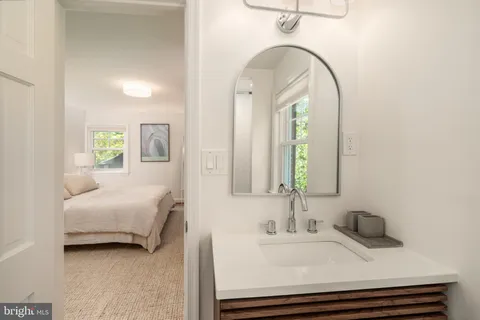 a bathroom with a shower and a toilet