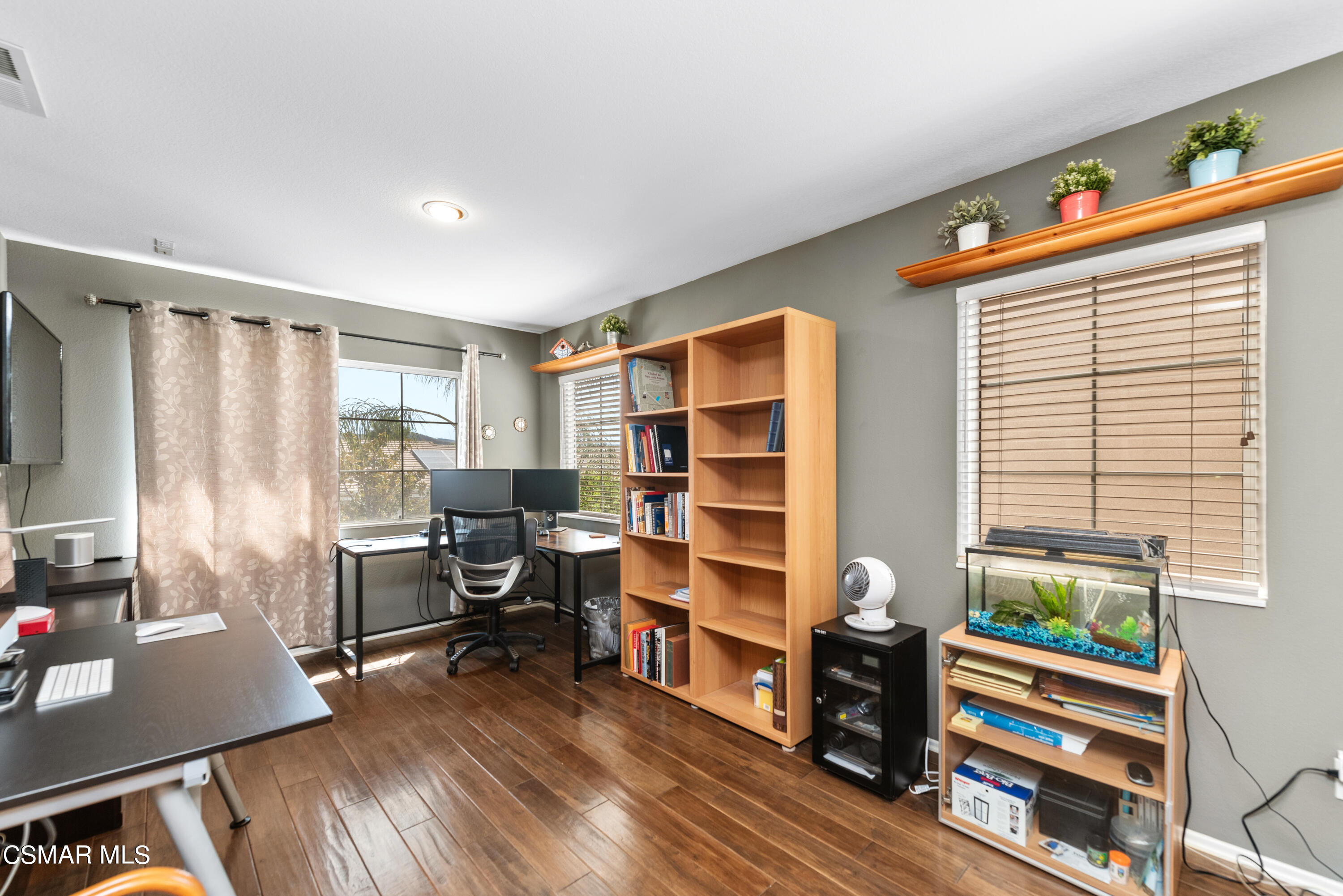 5248 Portia Street Simi Valley, CA 93063 - Photo 24 of 45 a view of a workspace with furniture and a window