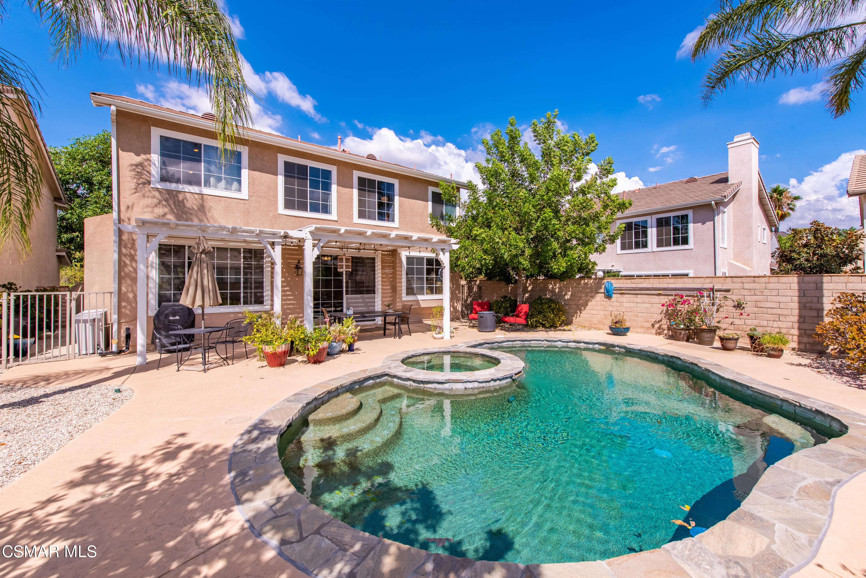 5248 Portia Street Simi Valley, CA 93063 - Photo 33 of 45 a view of a house with swimming pool