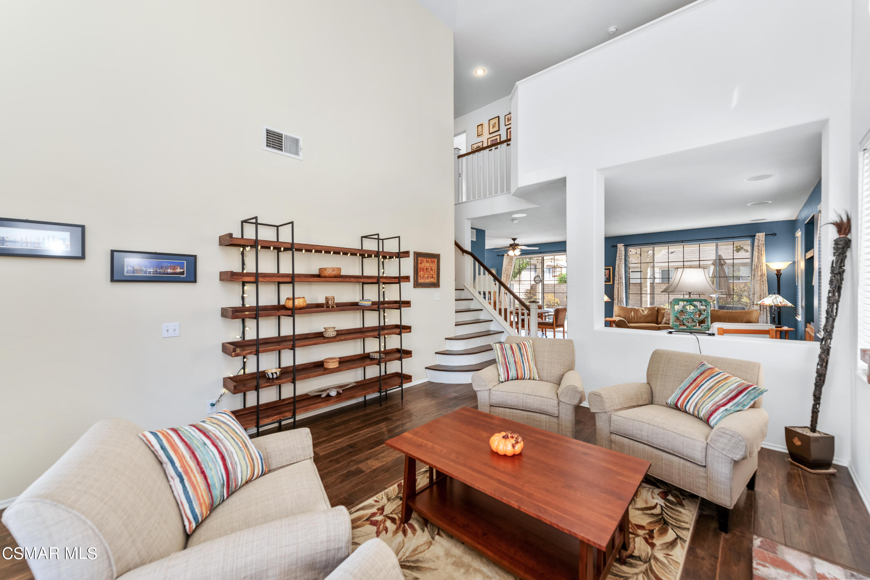 5248 Portia Street Simi Valley, CA 93063 - Photo 6 of 45 a living room with furniture and a book shelf