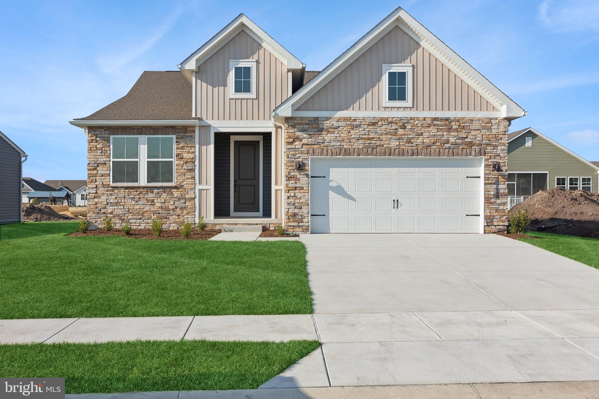 36332 Gate Drive Georgetown, DE 19947 - Photo 1 of 30 a front view of a house with a yard