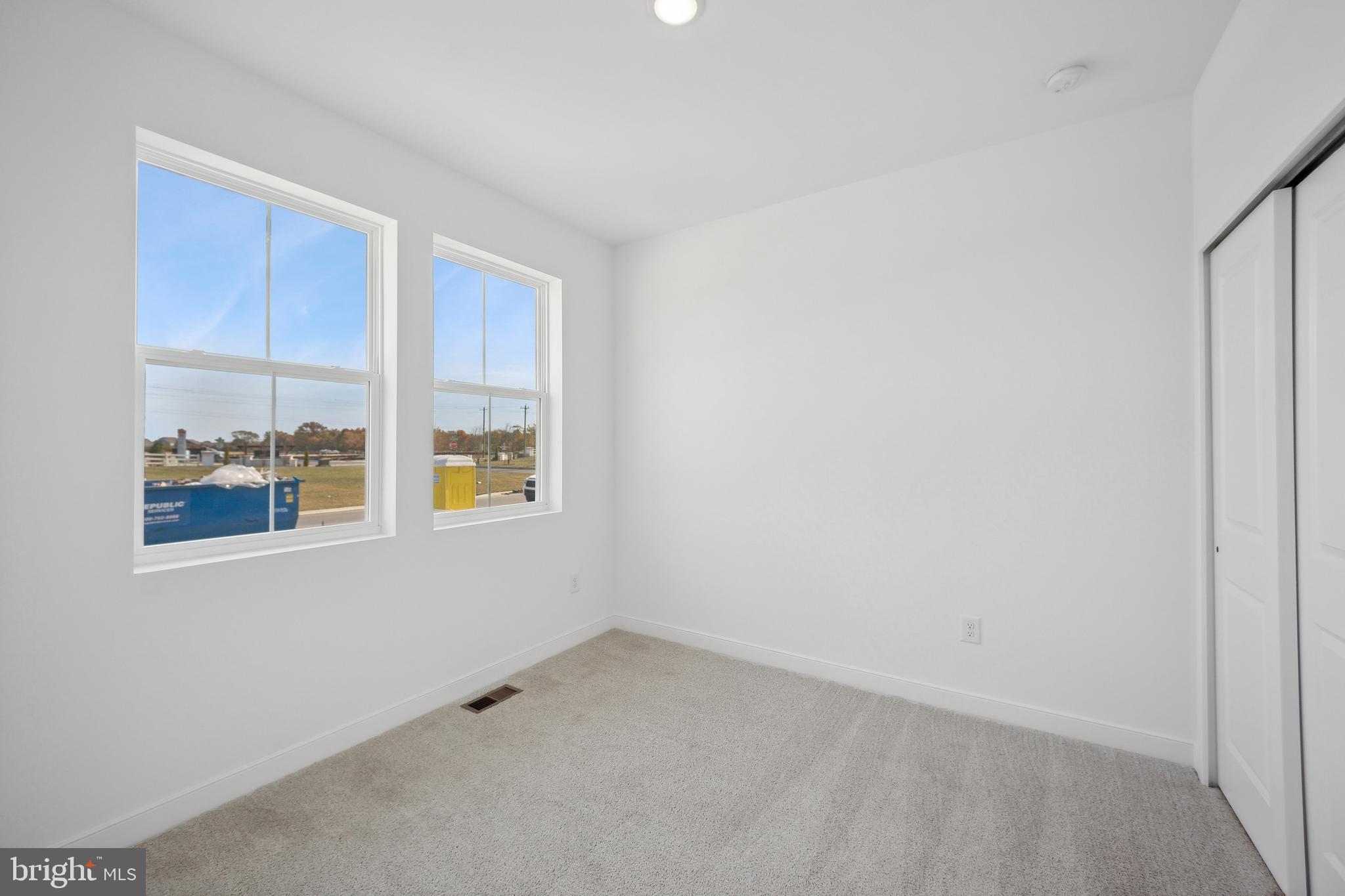 36332 Gate Drive Georgetown, DE 19947 - Photo 16 of 30 a view of an empty room with a window