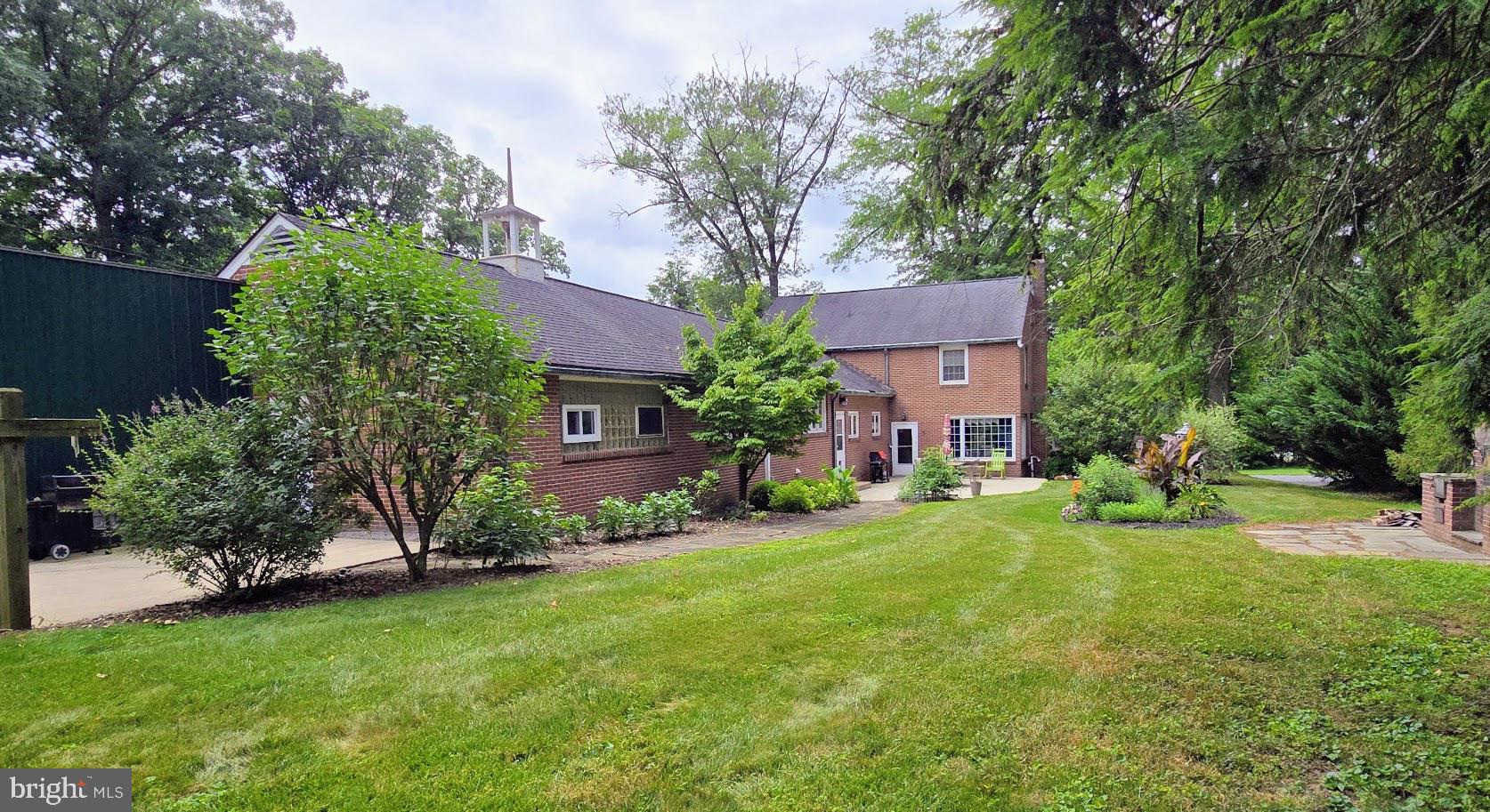 171 Nelson Road Mifflintown, PA 17059 - Photo 5 of 10 Lush greenery creates a secluded backyard.