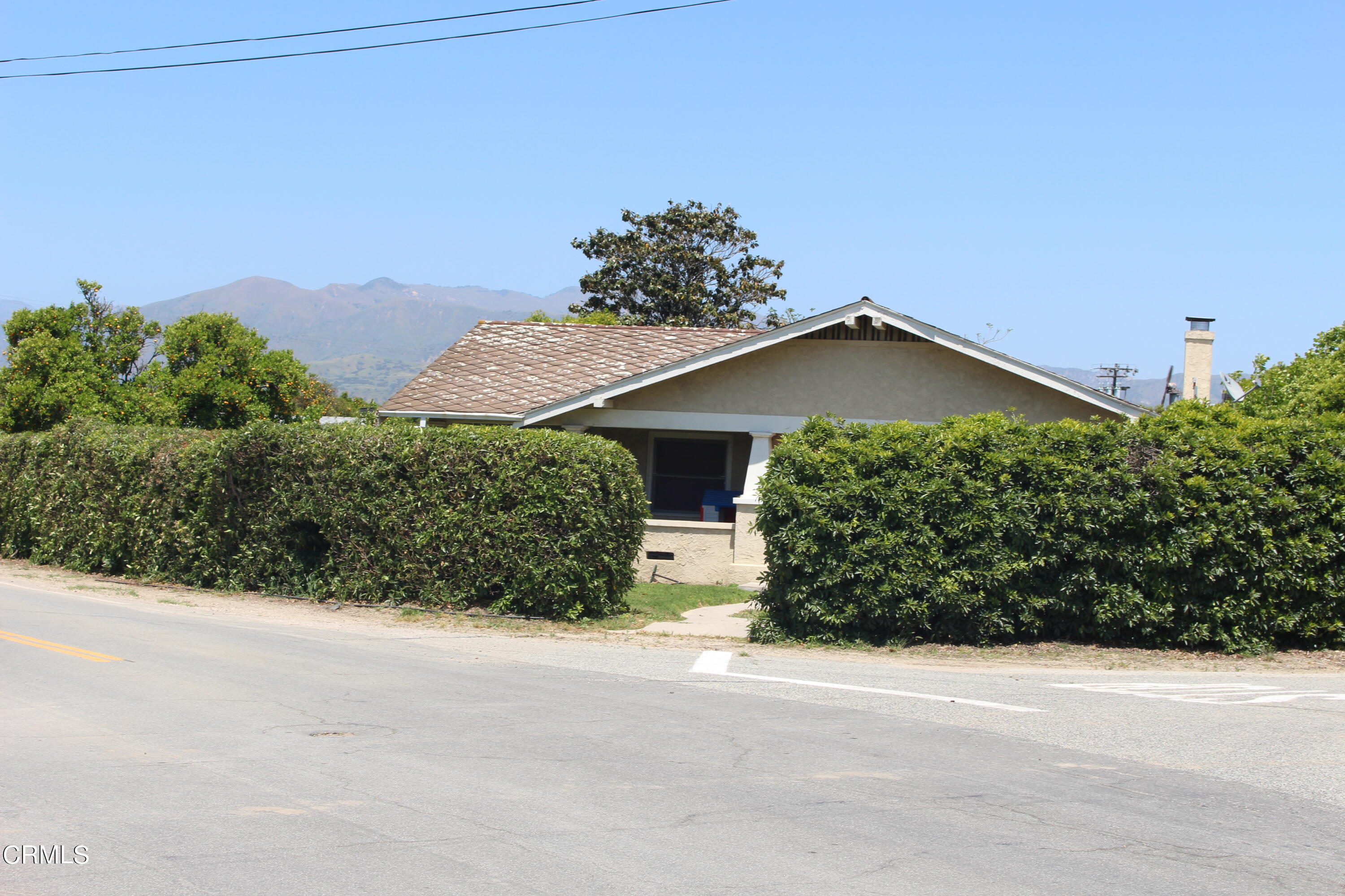 1396 South Sespe Street Fillmore, CA 93015 - Photo 12 of 20 a view of a house with a yard and plant