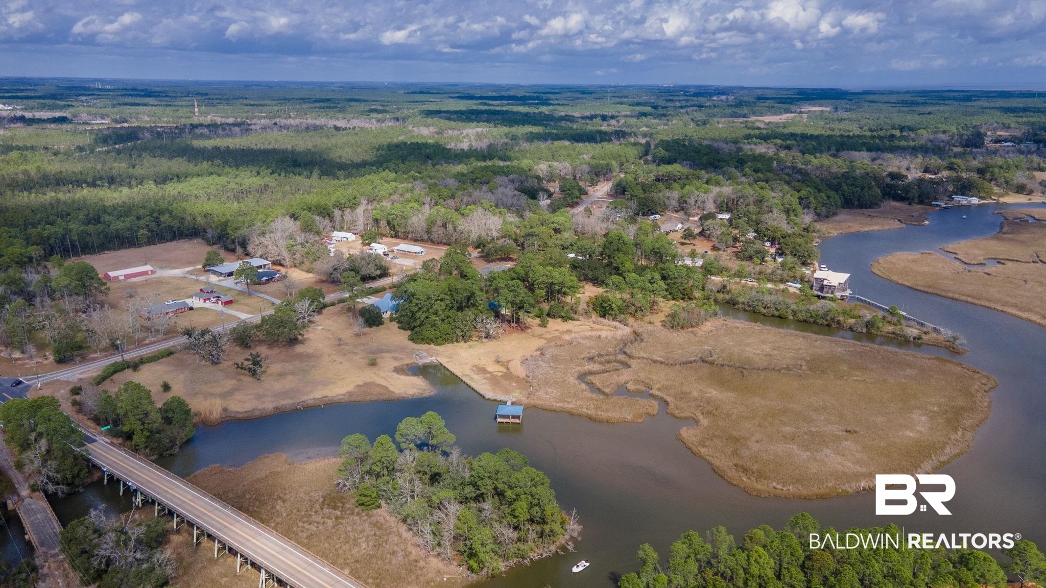 15025 Bellingrath Road Coden, AL 36523 - Photo 74 of 79 Drone / aerial view of a large body of water and a heavily wooded area