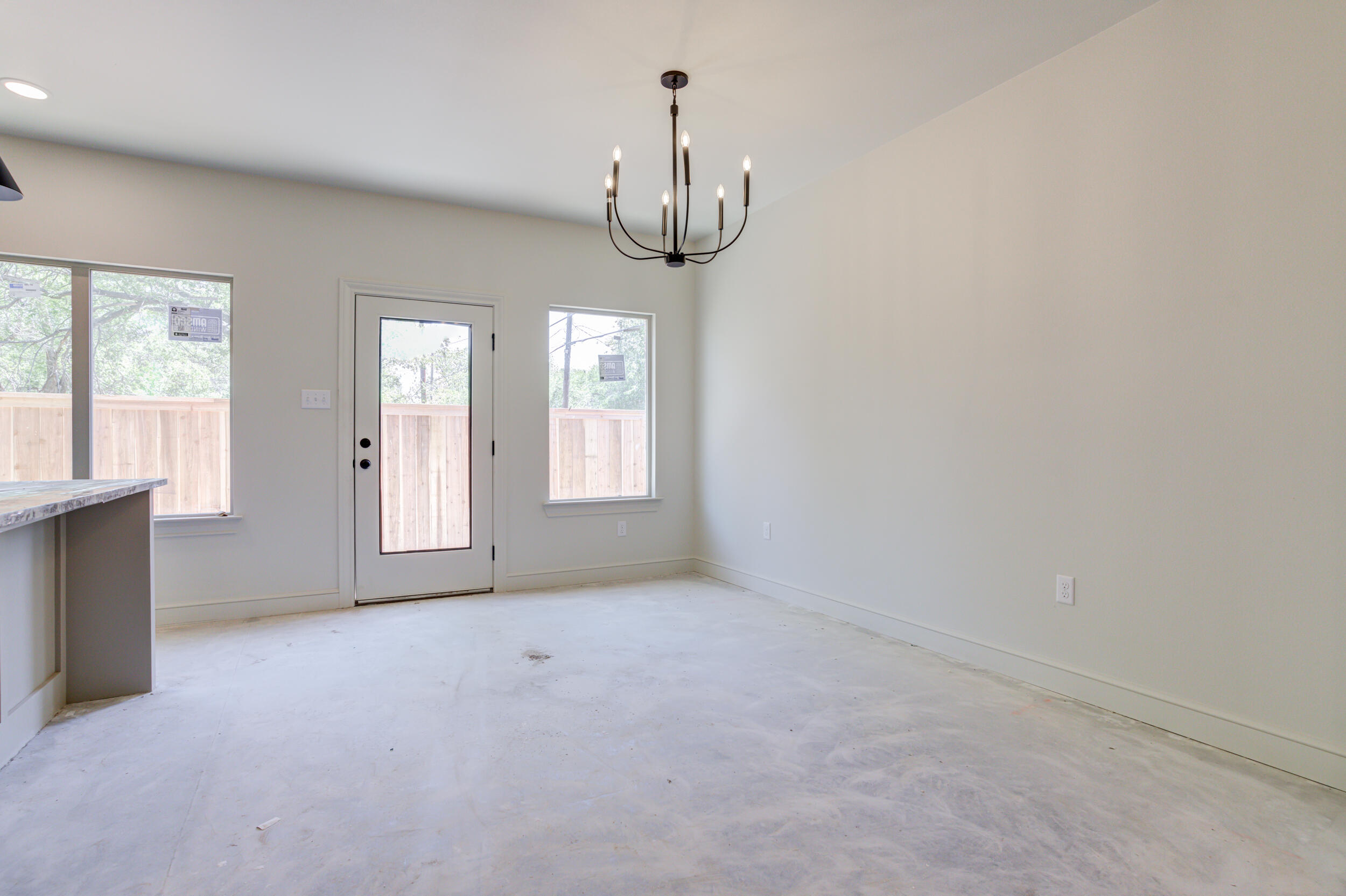 3419 24th Street Lubbock, TX 79410 - Photo 22 of 45 an empty room with windows